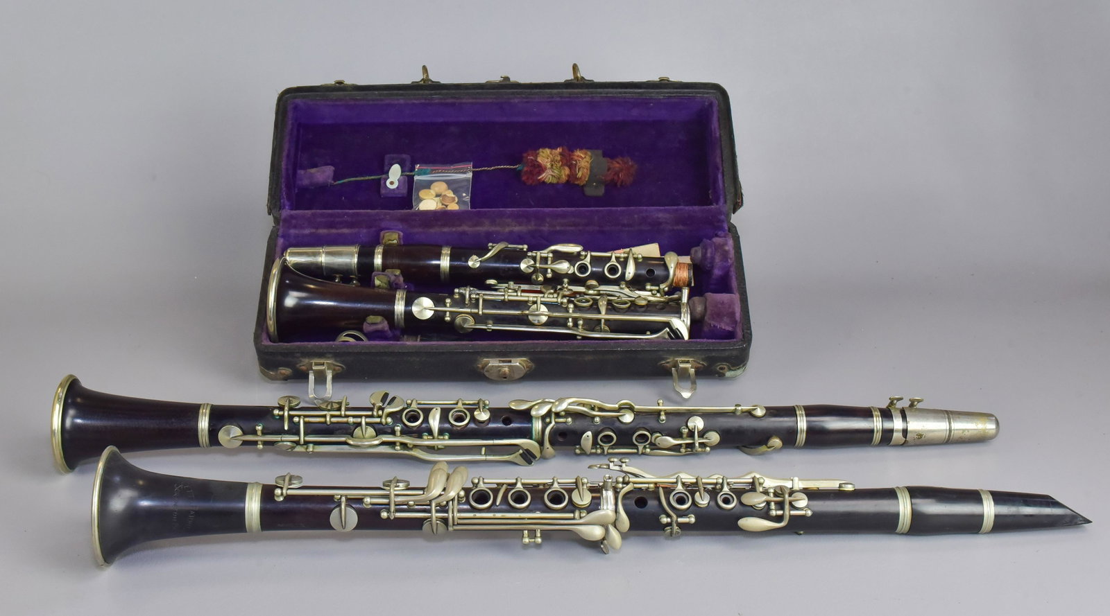 (3) Unmarked Wood Clarinets: (3) Unmarked wood clarinets, one with case, need refurbishing