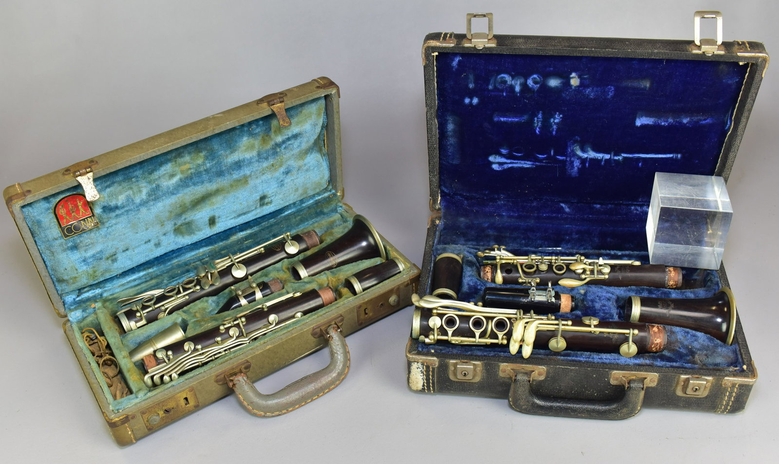 (2) "Stencil" Wood Clarinets: (2) "Stencil" wood clarinets, with cases, c/o A Fontaine serial #1963 (in a Conn case), Val's Artist made in France serial #4182, corks & pads need replacing