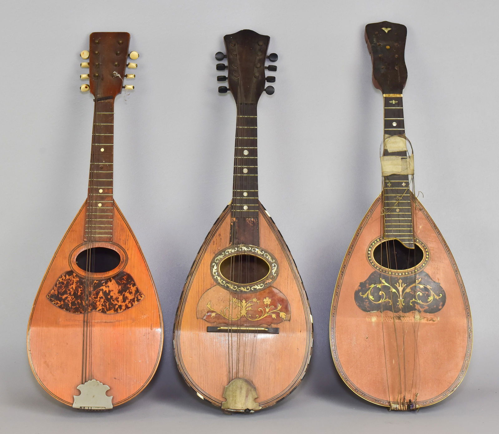 (3) Unmarked Melon Body Mandolins: (3) Melon body 8-string mandolins, all unmarked, c/o one with abalone inlaid pickguard (missing pegs & bridge), one with inlaid pickguard (missing some veneer), one with tortoise design pickguard (mis