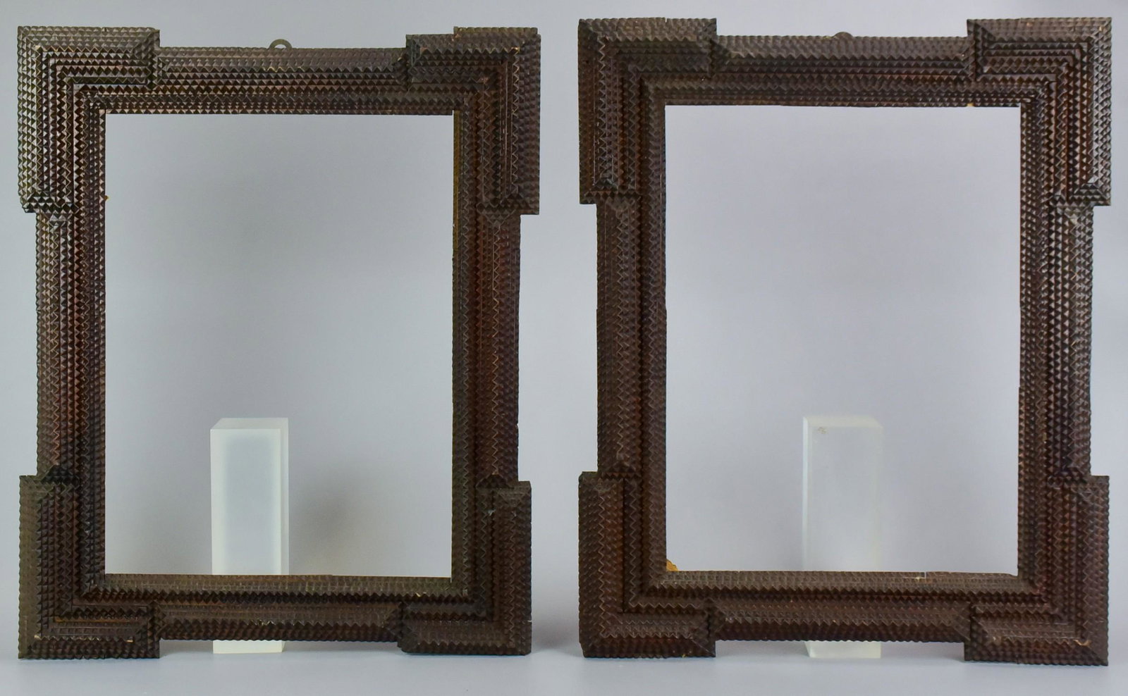 Pair of Tramp Art Picture Frames: Pair of tramp art picture frames, 15-7/8" x 11-3/4" opening, 22" x 17-3/4" overall