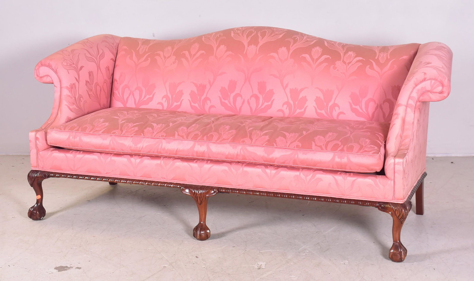 Hancock and Moore Chippendale style camelback sofa: Hancock and Moore Chippendale style camelback sofa, floral pink upholstery, 36"h x 84"w x 34"d