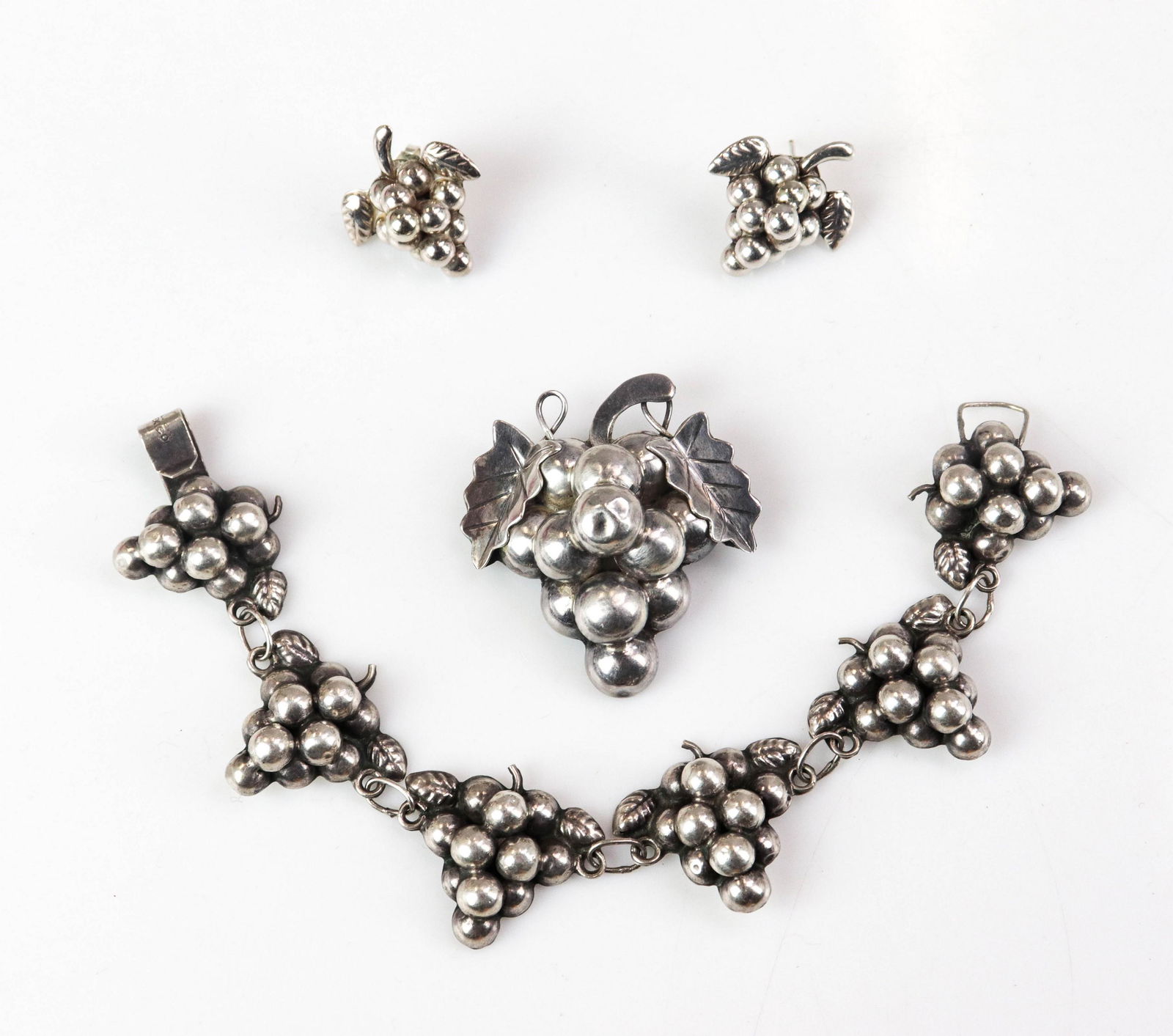 (3) Pc Sterling Silver Jewelry Set: (3) Pc Sterling Silver Jewelry Set, Lot C/O; (1) 7.5" grape design link bracelet, (1) Matching pin, (1) pair of earrings, 1.00 Oz.