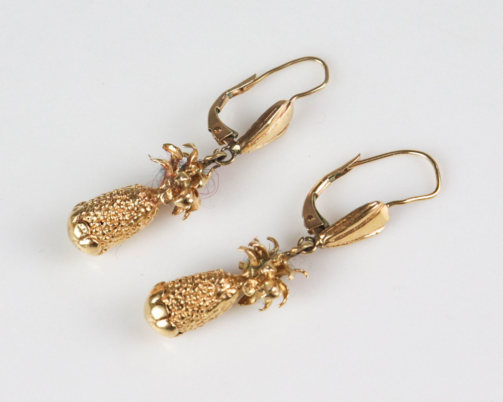 14K Yellow Gold Pineapple: 14K Yellow gold Pineapple lever back drop earrings; 8.4 Dwt.