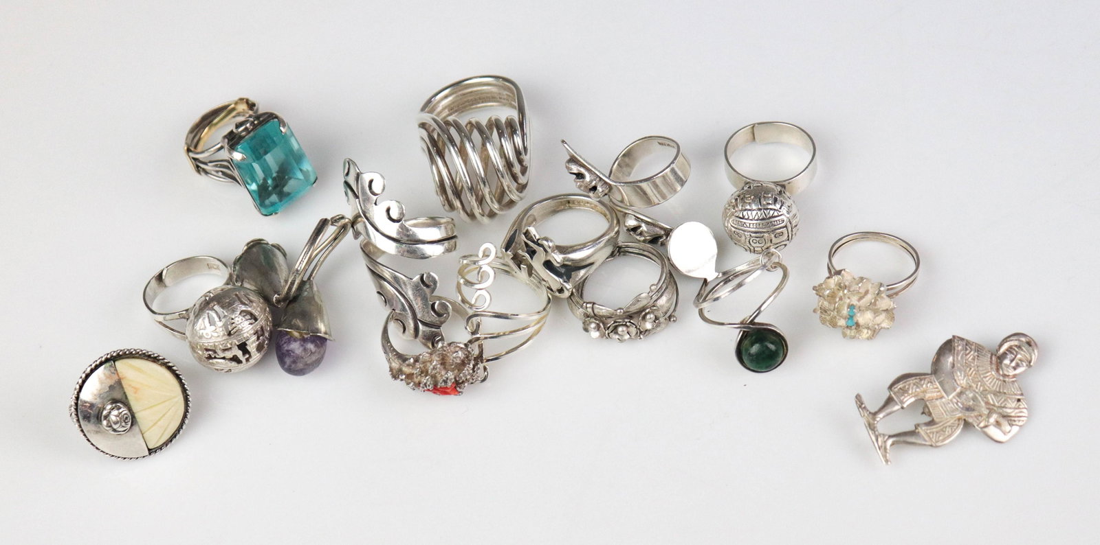 (15) Sterling Silver Rings: (15) Sterling Silver Rings; Lot C/O; (3) Peruvian Designed jewelry pcs, pin, and two matching rings, (1) Taxco Mexico ring; (1) modern ring, (5) marked sterling rings (1) blue stone silver ring, and (