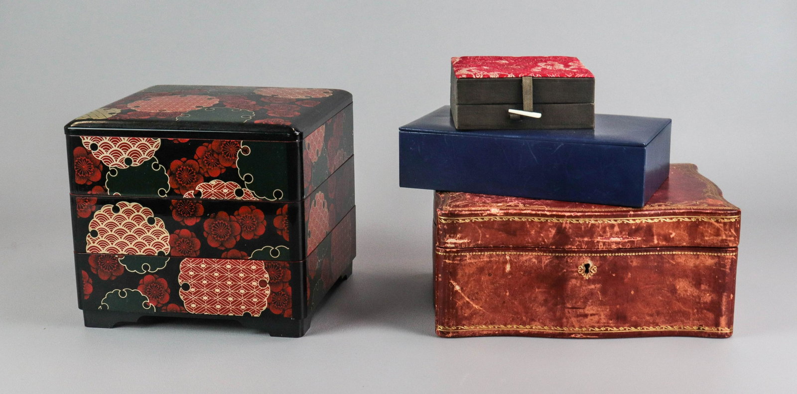 (4) Jewelry Boxes: (4) Jewelry Boxes; (1) Antique style red leather jewelry box, (1) blue jewelry box, (1) stacking jewelry box, and (1) small jewelry trinket box.