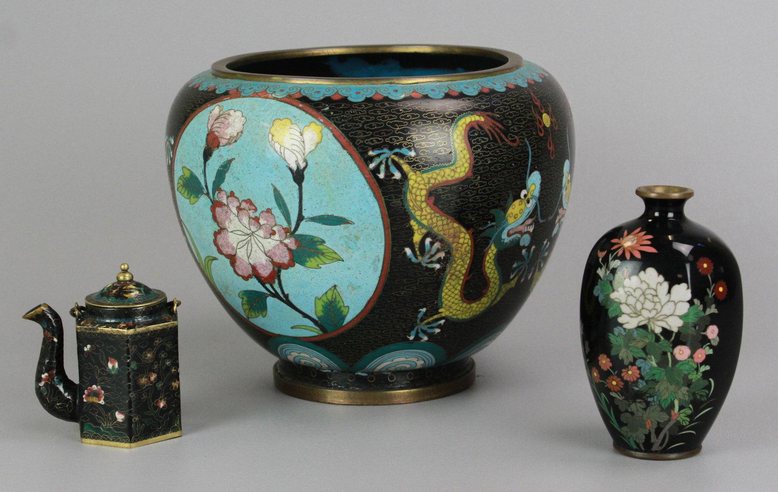 (3) Pcs Asian Cloisonne: (3) Pcs Asian cloisonne, c/o Vase (4-3/4" h ), miniature tea kettle (3-1/4" h), Vase with dragon decoration, 6-1/2" h x 8" dia, Air bubbles throughout cloisonne, all-over, some losses and scratches, d