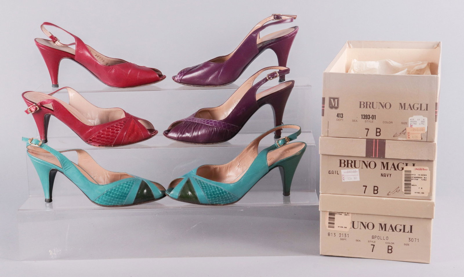 (3) Pair Bruno Magli Leather and Skin Pumps: (3) Pair Bruno Magli leather and skin pumps, maroon 6-1/2 B, teal and purple 7 B, digs at back of heels, most severe on purple.