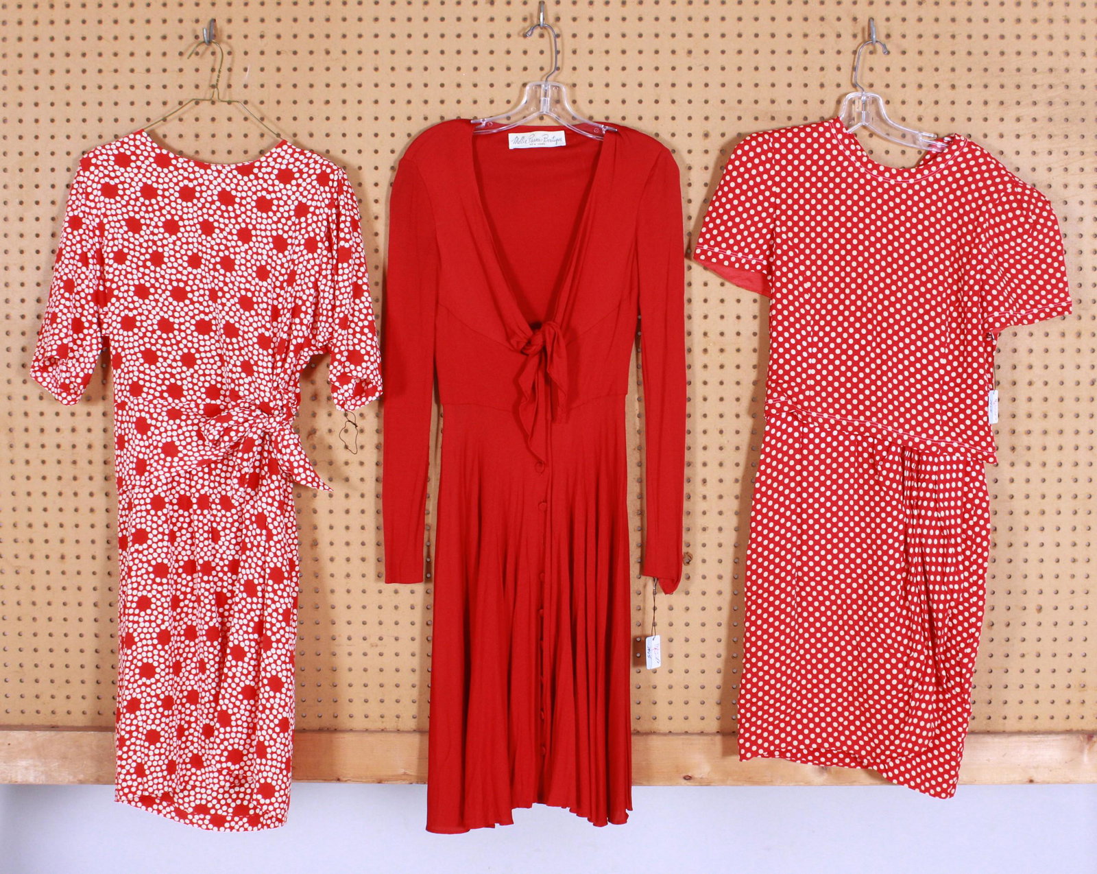(3) Vintage 70's-80's Designer Dresses: (3) Vintage 70's-80's designer dresses to include knit Mollie Parnis Boutique New York tie neck button front mini dress, 27" bust, 28" shoulders, 22" waist, missing two buttons, some discoloration, ex