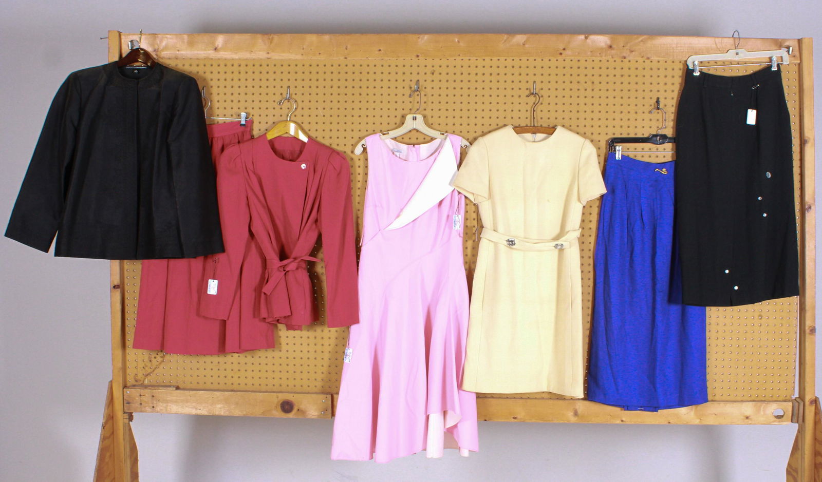 Modern and Vintage Inspiration Grouping: Modern and vintage inspiration grouping to include Valerie Stevens tailored skirt with gold tone saxaphone and piano charms at waist and hip, marked 8, 27" waist, JH Collectibles tailored wool skirt w