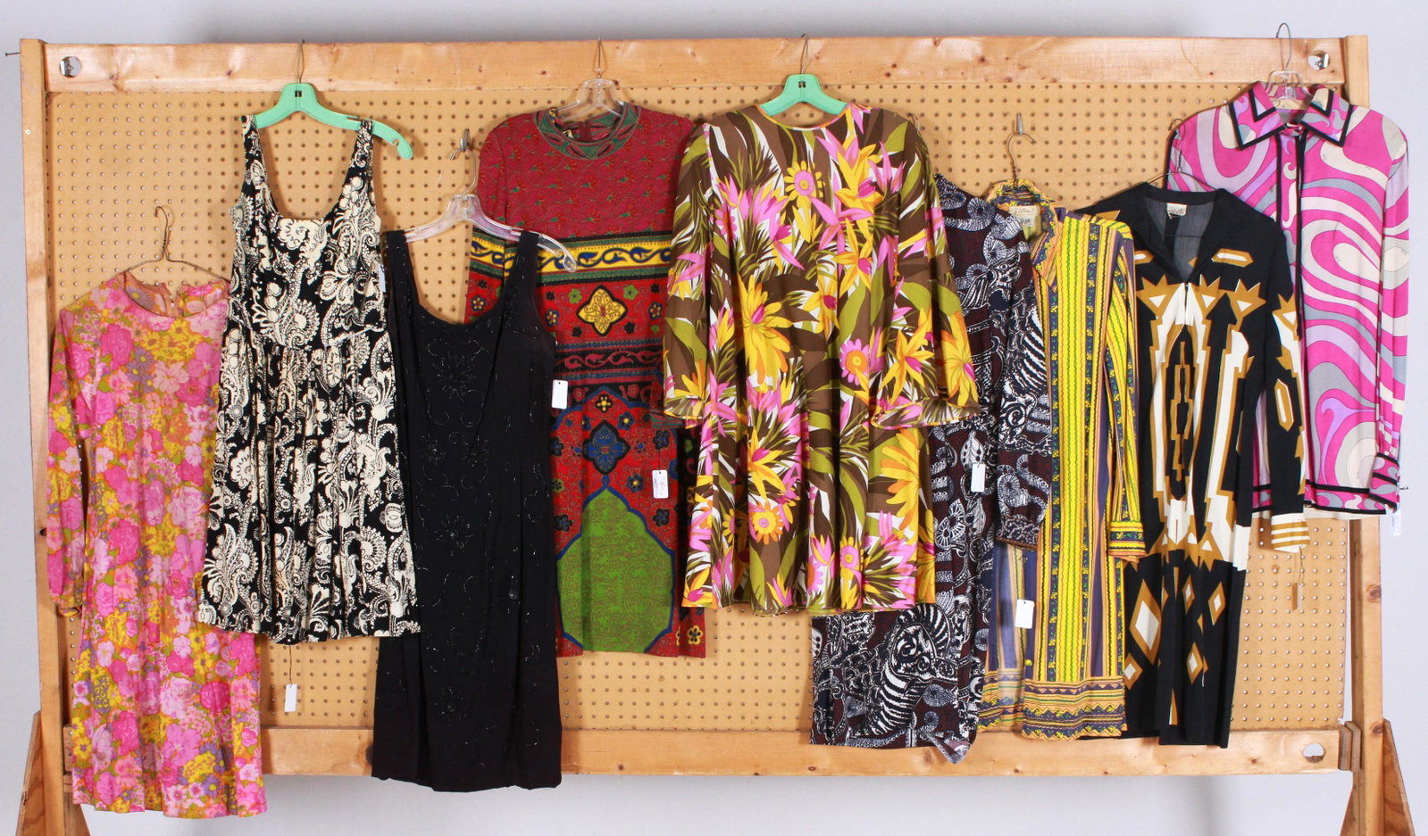 (10) Pc Dress Inspiration Grouping: (10) Pc Dress inspiration grouping to include Emilio Pucci all silk mini dress with gathered sleeves at hem, discoloration, stains, pulls and damage, marked size 10, modern 2/4, B. Altman retailed Gol