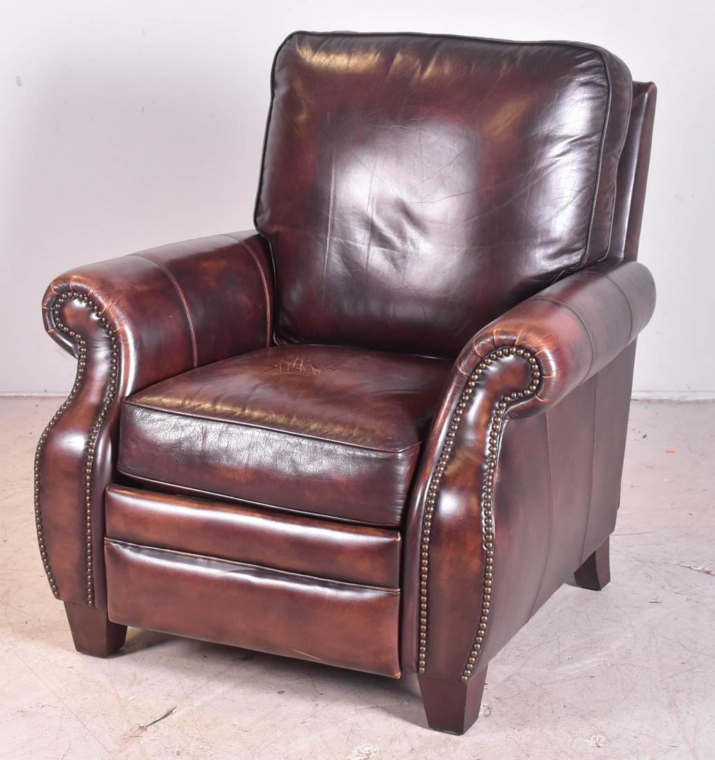 Bernhardt brown leather recliner: Bernhardt brown leather recliner, wood feet, 37"h x 31"w x 33"d, light wear to leather