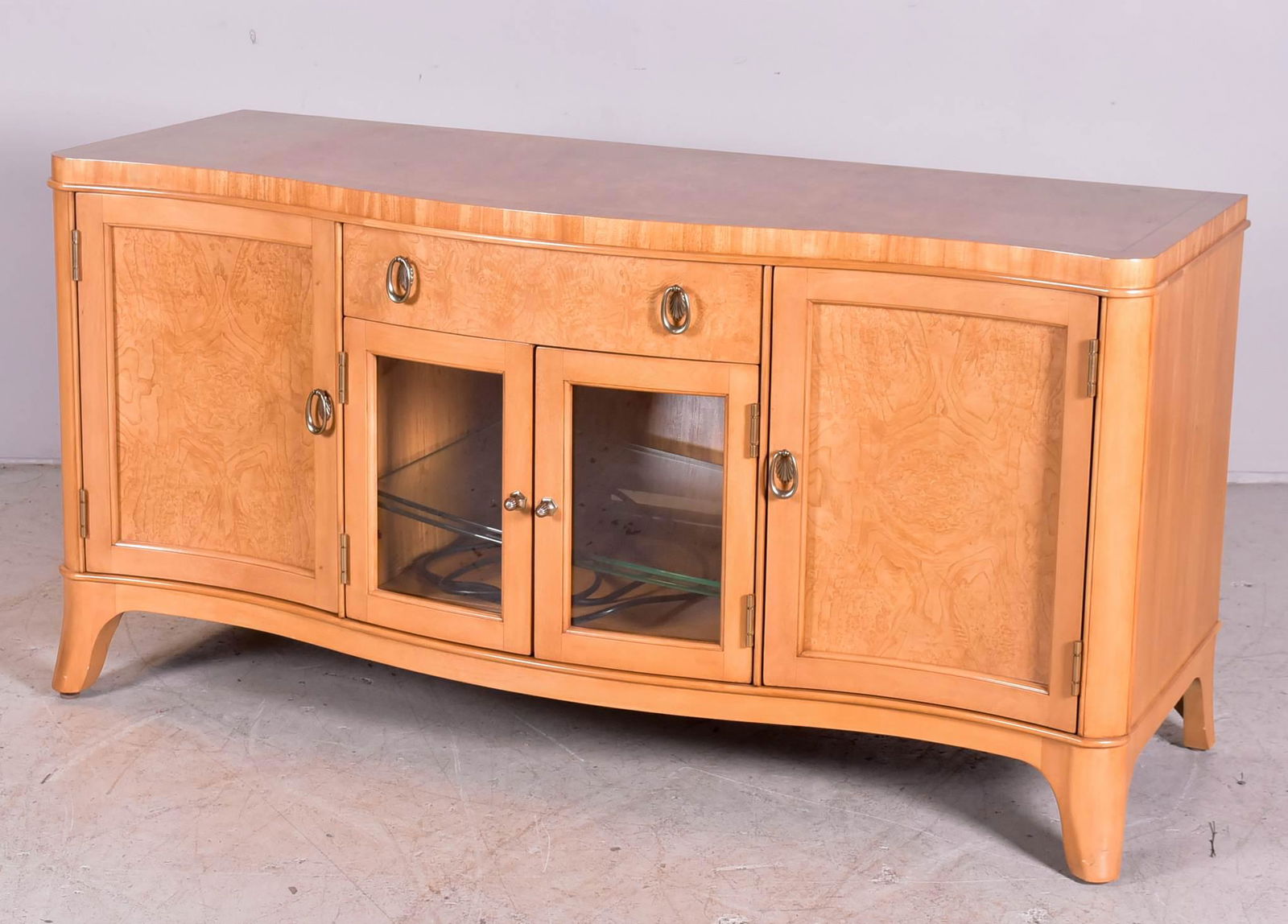 Thomasville Bogart entertainment cabinet: Thomasville Bogart serpentine front entertainment cabinet, one drawer over two glass doors flanked by two doors, 31"h x 60"w x 21"d