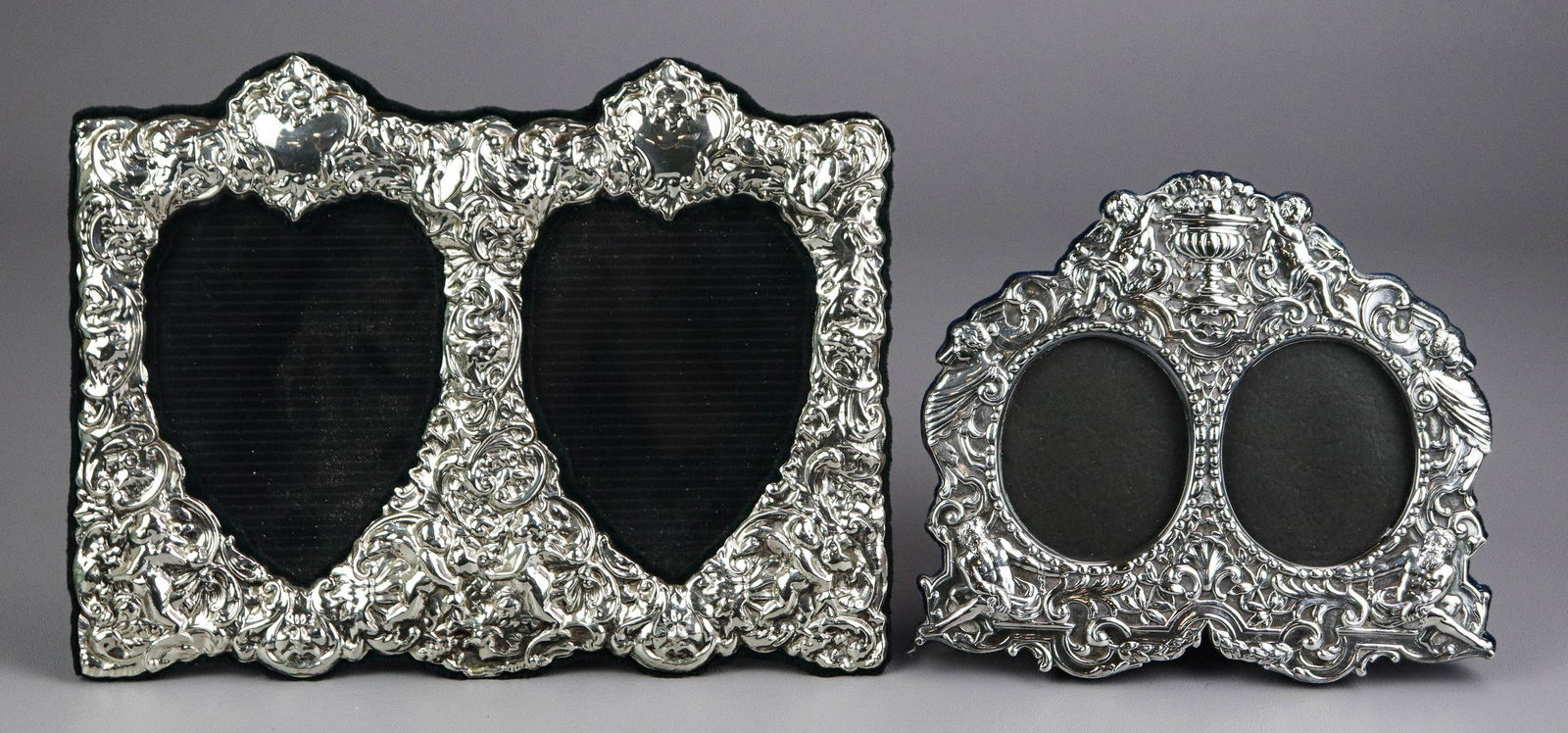 (2) Ornate Sterling Double Picture Frames: (2) Ornate sterling silver double picture frames, largest 7-1/4" x 9-3/4"