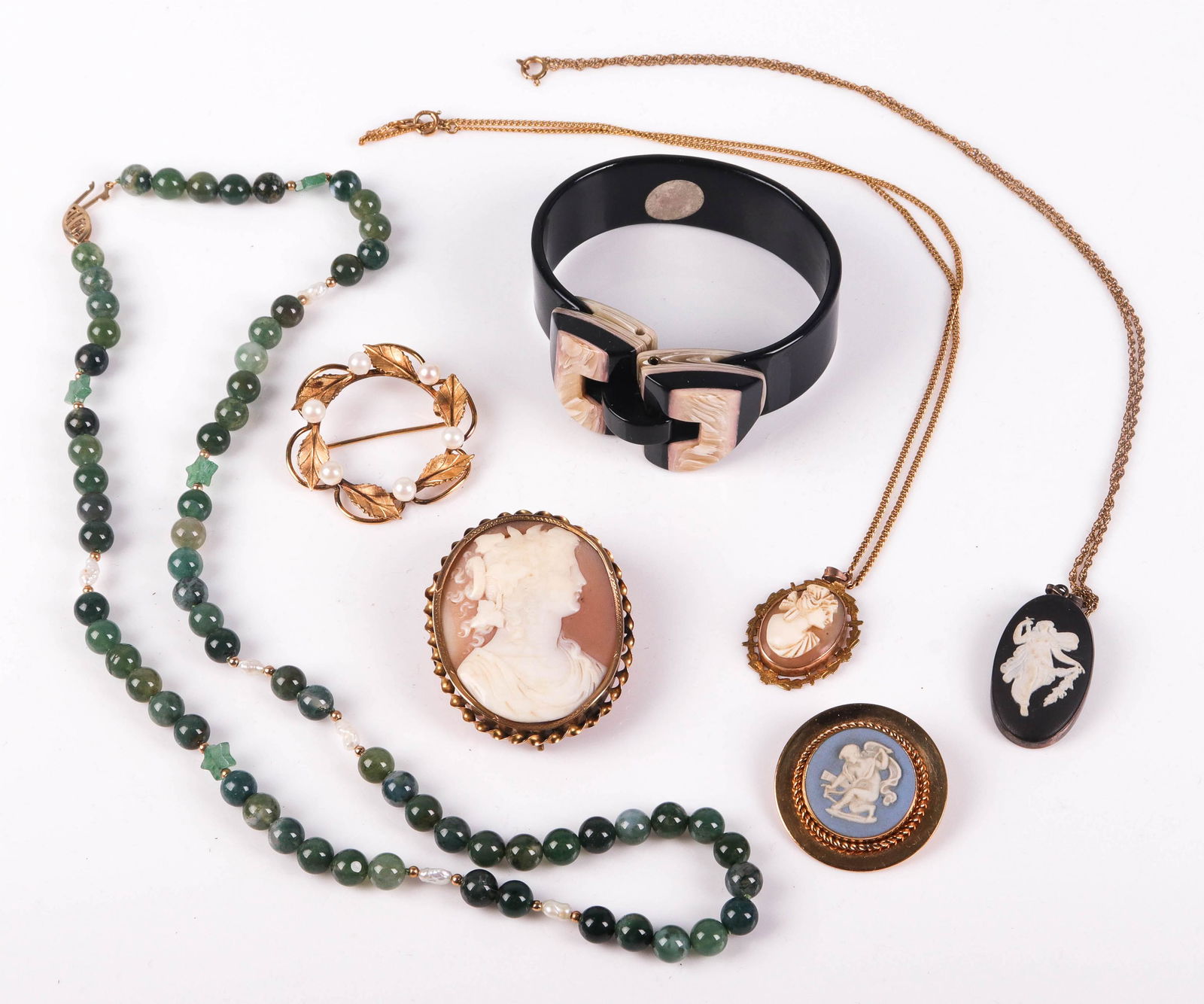 (7) Gold and Gold Filled Jewelry: (7) Gold and Gold filled Jewelry lot C/O: (1) beaded jade necklace, (1) GF leaf and pearl brooch, (1) gold plated wedgwood brooch, (1) Wedgwood silver pendant on a gold filled chain, (1) antique unmar