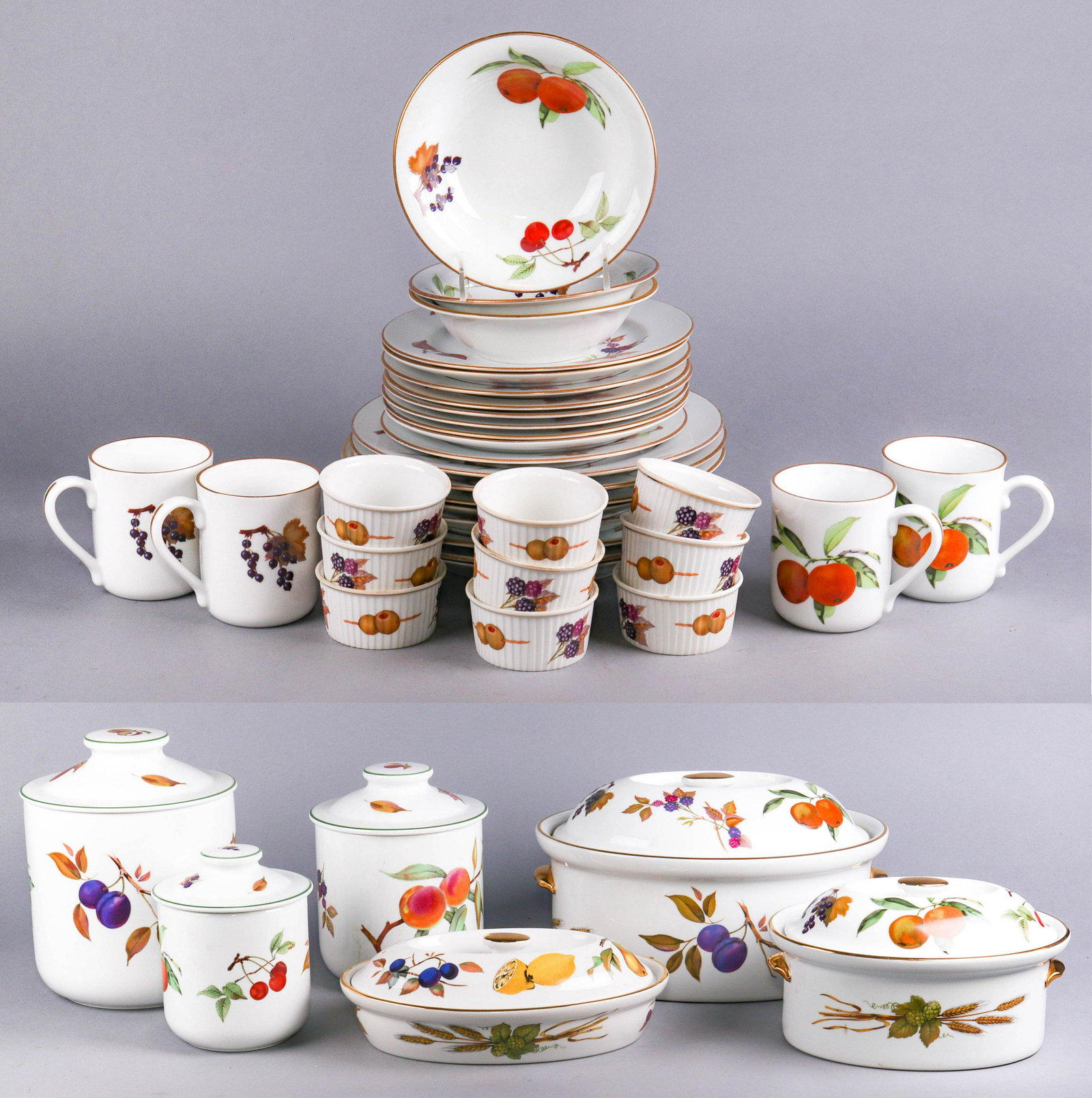 (39) Pcs Royal Worcester Evesham Dinnerware: (39) Pcs Royal Worcester porcelain dinnerware, Evesham pattern, c/o (8) 10" dinner plates (1 chipped), (9) 8-3/8" salad plates, (3) 6-5/8" cereal bowls, (4) mugs, (9) ramekins, (2) covered casseroles 