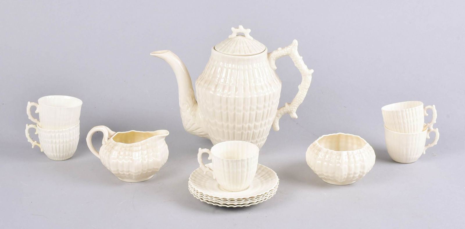 (13) Pcs Belleek Demitasse Set: (13) Pc Belleek porcelain demitasse tea set, black mark, c/o coffee pot, sugar, creamer, (5) demitasse cups, (5) demitasse saucers
