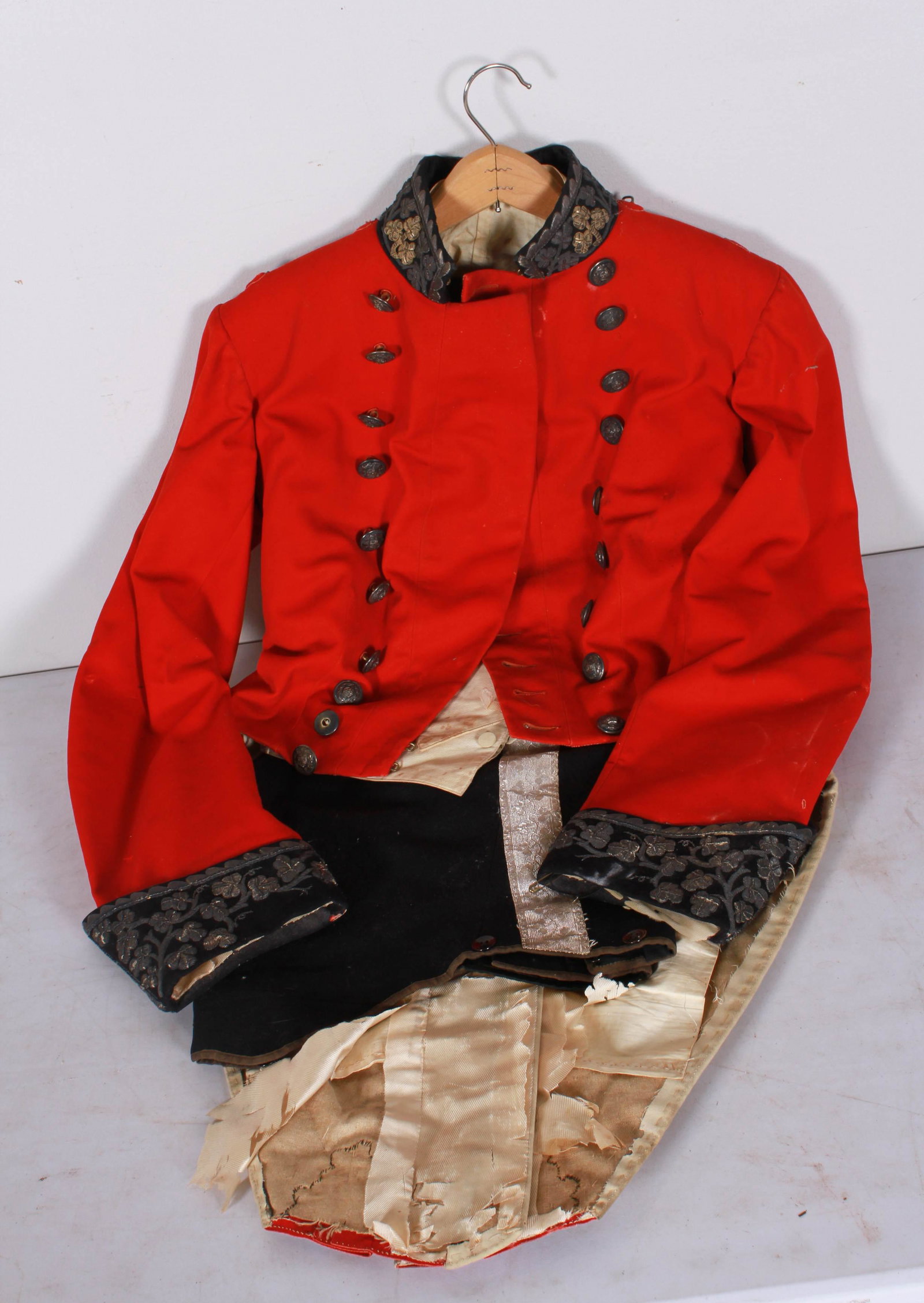 Early Irish Officers Dress Uniform: Early Irish officers dress uniform to include red wood, linen and lined tailed jacket with Pitt and Co. livery buttons and clover bullion at collar, sleeves and tails, cotton vest and trousers with bu