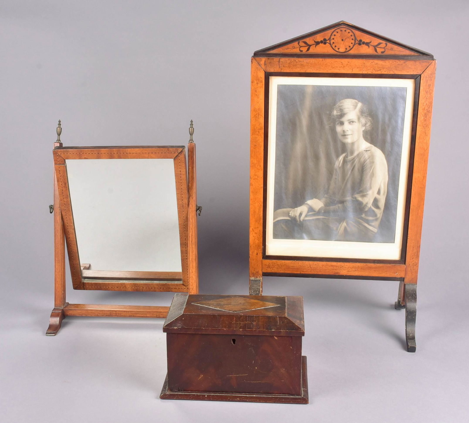 (3) Tabletop Mirror, Frame and Box: Tabletop mirror, frame and box to include inlaid maple frame on raised scroll feet, 22" x 12", inlaid tabletop mirror with urn form finials, damage and splits, 15"x11" and veneered dresser box with di