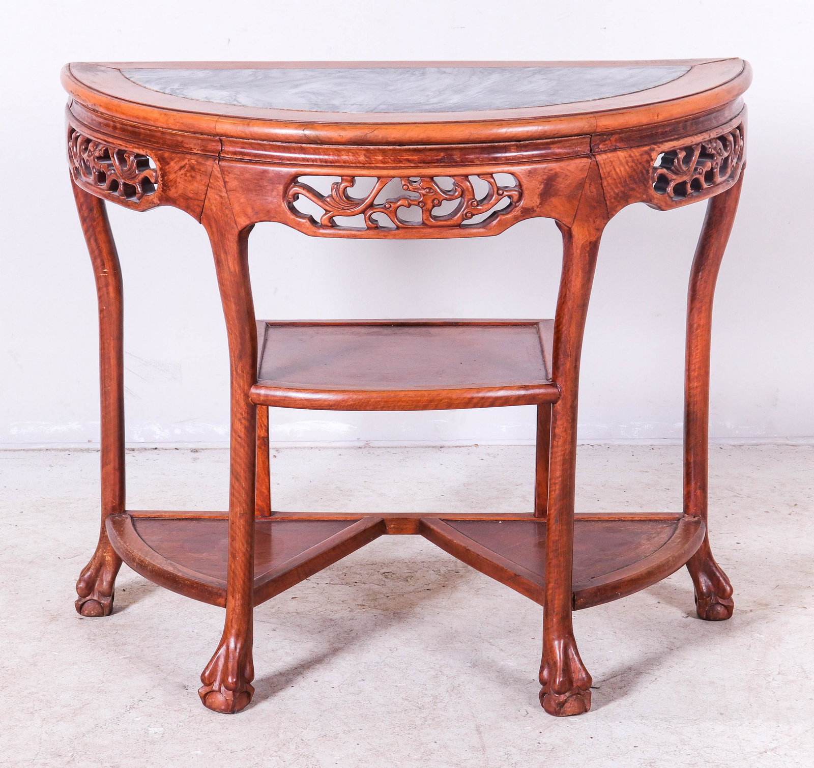 Chinese Chippendale style demilune marbletop console: Chinese Chippendale style demilune marbletop console, inset marble, pierced carved skirt, step down lower shelves, 32"h x 38"w x 19"d, wear due to age and use