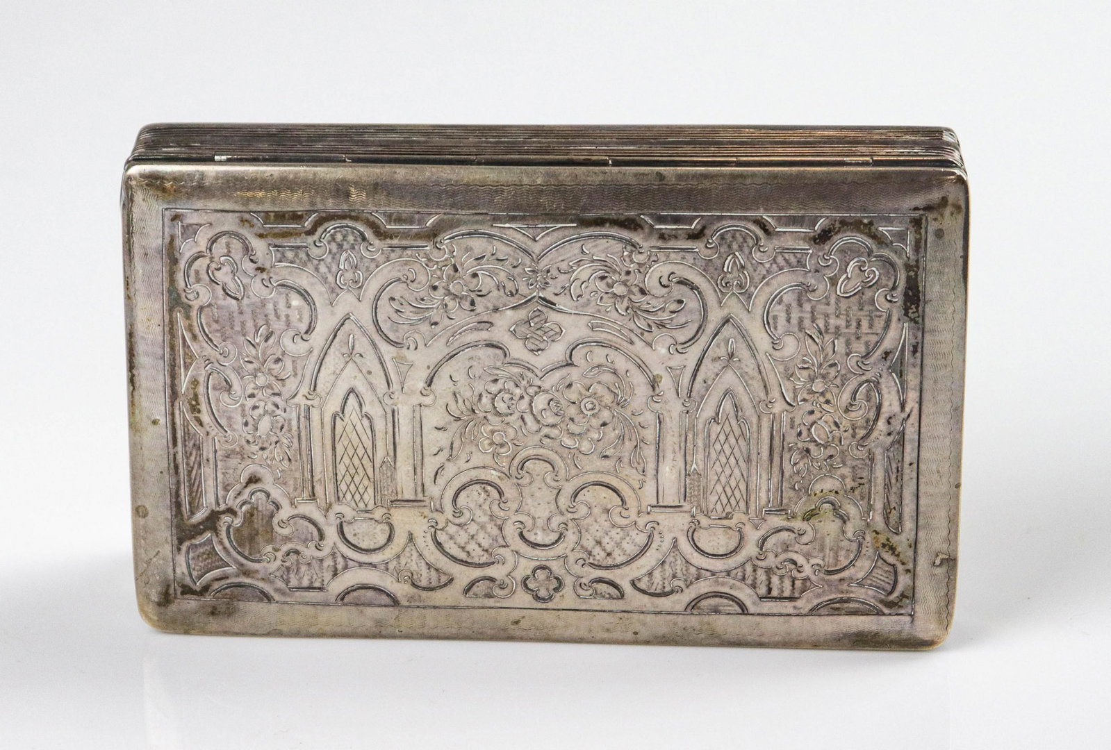 Dutch Silver Etched Box: Dutch silver etched box, lion passant, minerva head and A marks, etched decoration at top in floral and scroll scene, 5-1/2"x3-1/4"x1", 'DVW" lightly etched under lid, 5 T.O