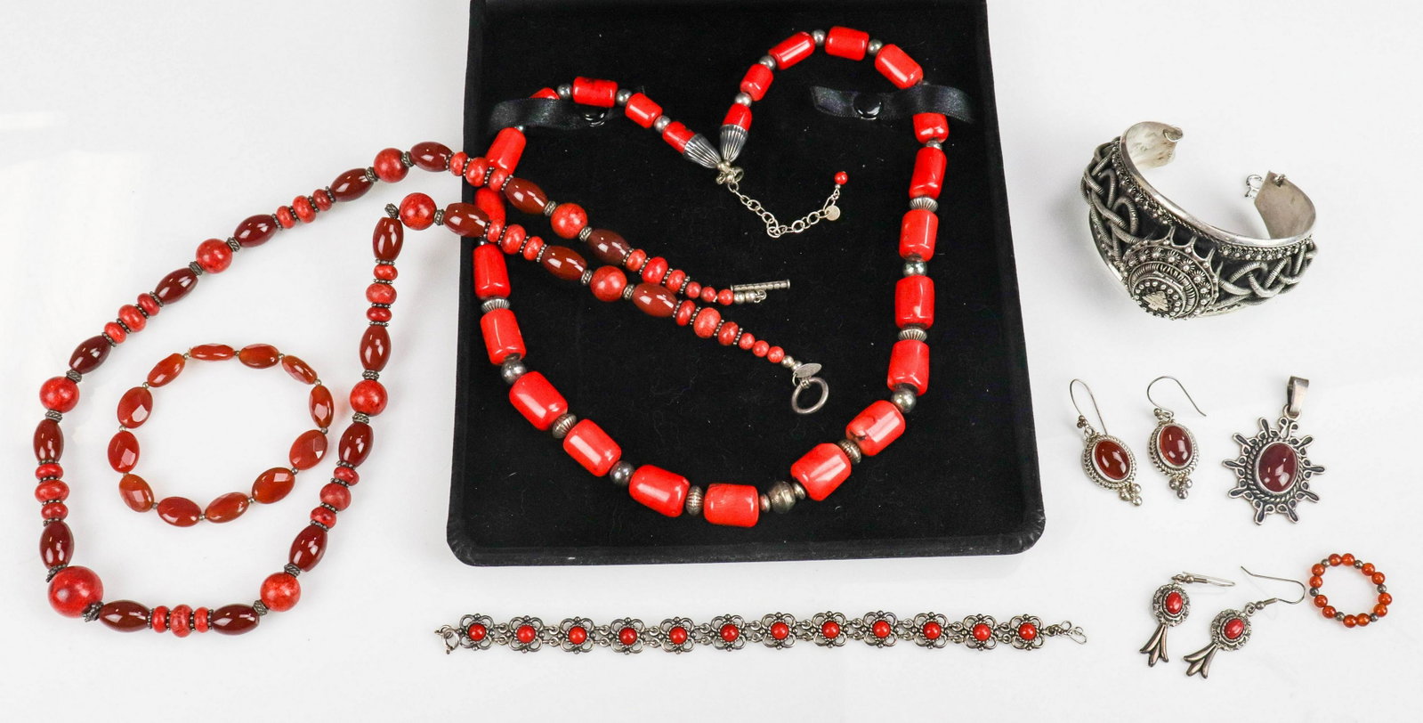(9) Pc Sterling Silver Jewelry Lot: (9) Pc Sterling Silver Jewelry Lot; C/O: (1) ; (1) Syrian Silver Bracelet, hallmarked " Silver made in Syria", large cuff with safety chain attached, the bracelet features a hinged compartment at the 