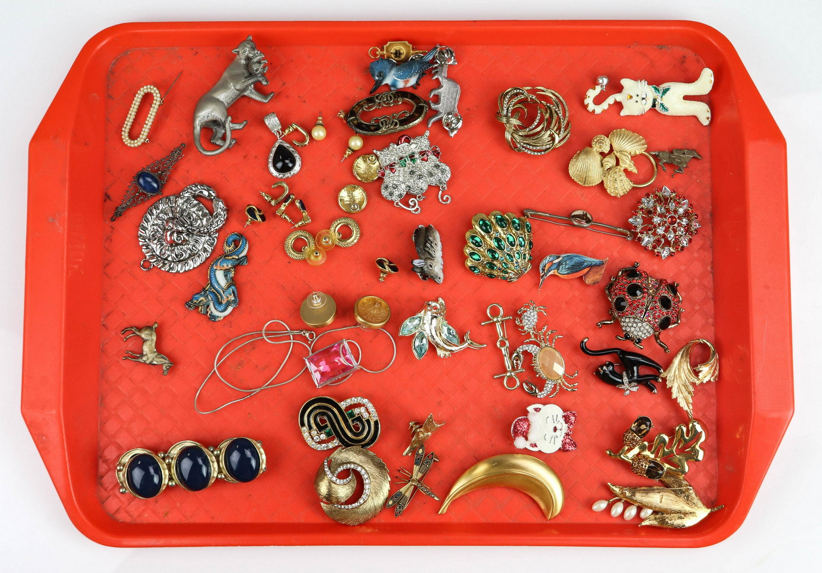 Decorative Box and Fashion Jewelry: Decorative box and Fashion Jewelry, lot C/O; (1) large red box with padlock hinge, (no lock) containing 3 plastic sorting containers. This lot contains (31) pins-brooches,most singed Monet, Napier and