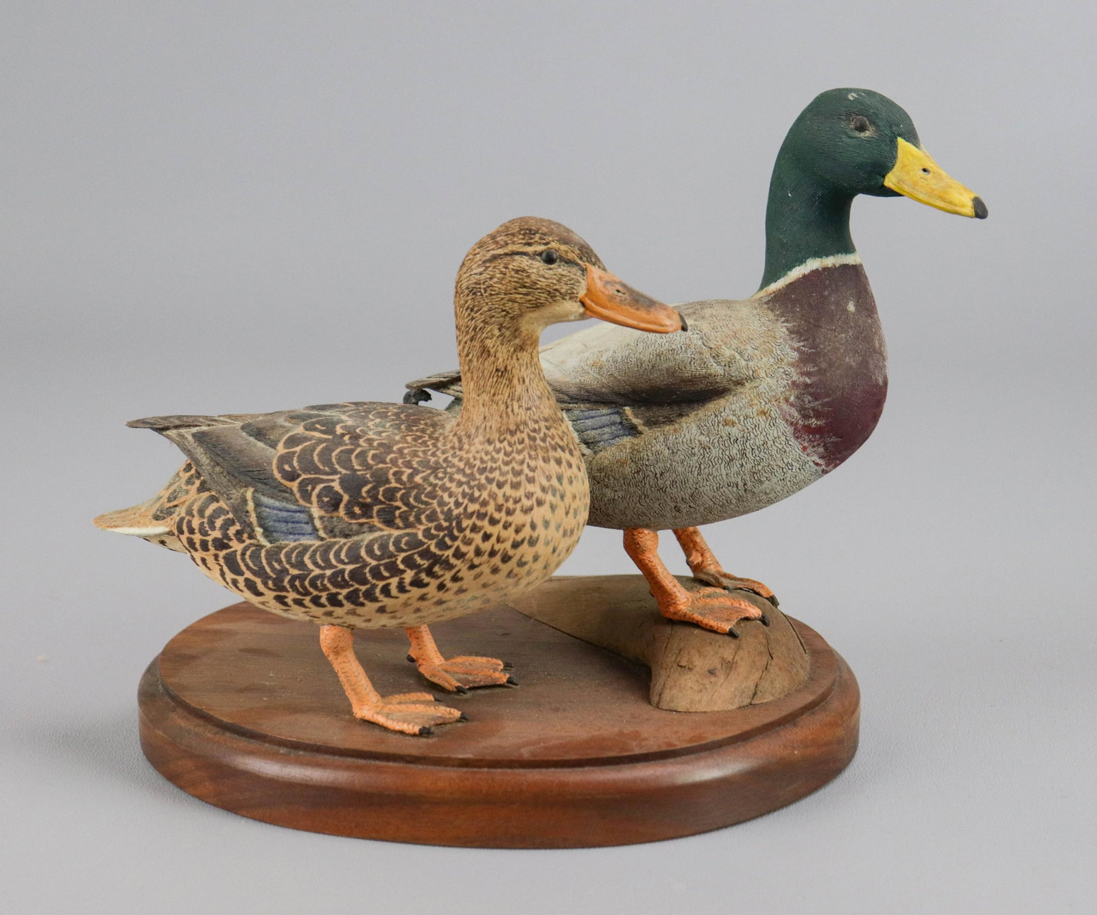 Robert Warfield Carved Mallard Ducks: Pair of carved & painted wood ducks by Robert Warfield, Mallard male & female, signed on base, 1982, on wood base, 6-1/2" h