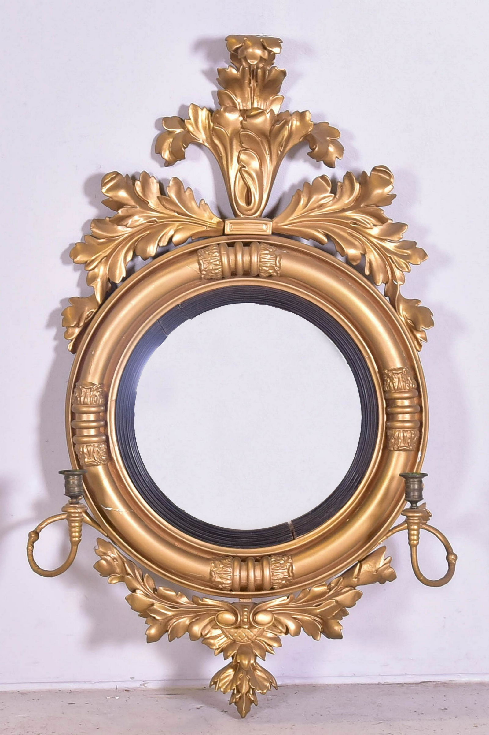 18th c English Regency Convex mirror with candle arms: 18th c English Regency Convex mirror with candle arms, gilt painted frame with ebonized reeded mirror surround, 34-1/2"h x 21-1/2"w, wear to gilt, some repairs to frame, Cracks and wear to paint, over