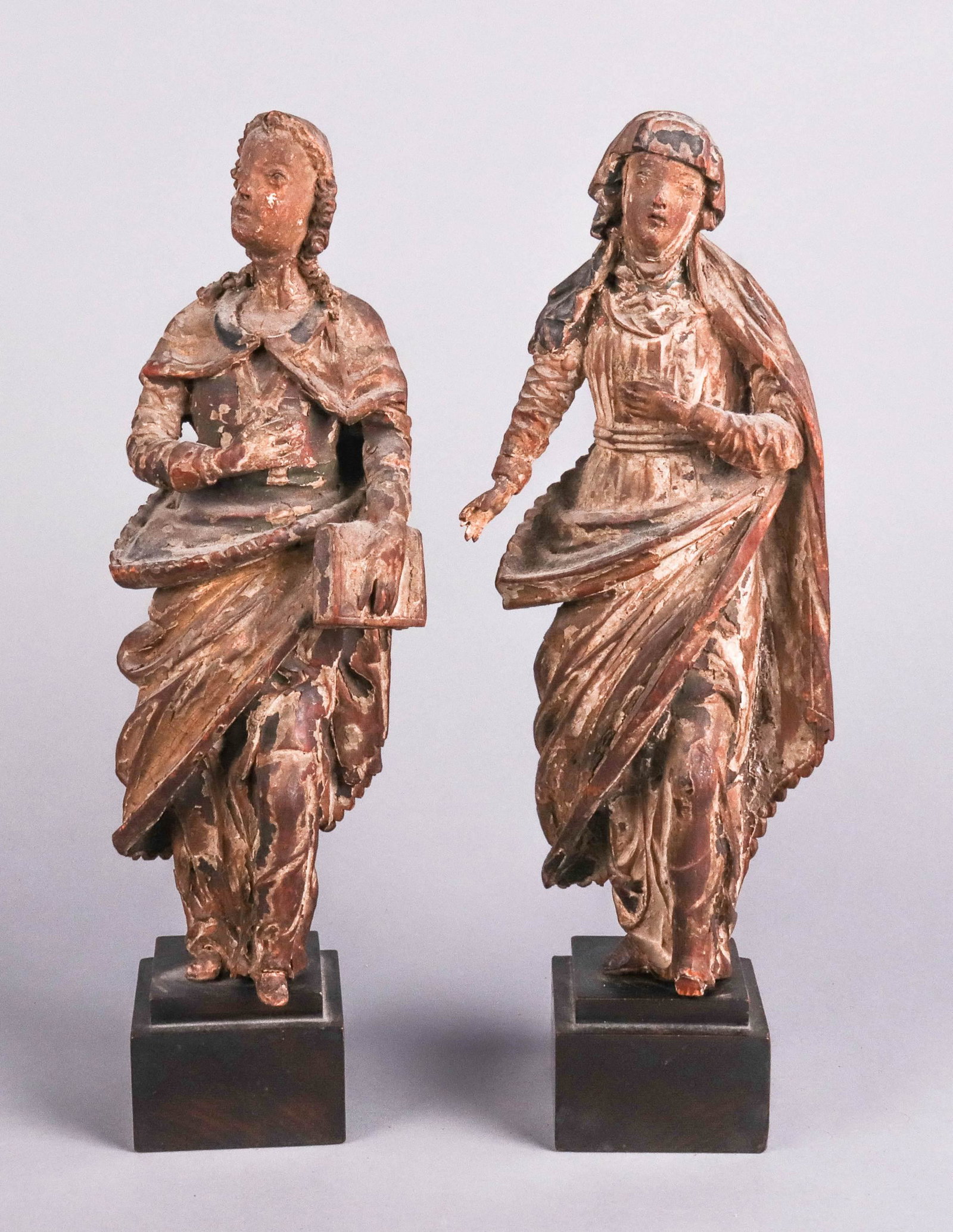 (2) Carved Walnut Religious Figures: (2) French late Gothic carved walnut religious figures, Virgin Mary & Saint Anne, 16th C, each mounted to wood plinth base, 13-1/8" h overall, paint loss & chips