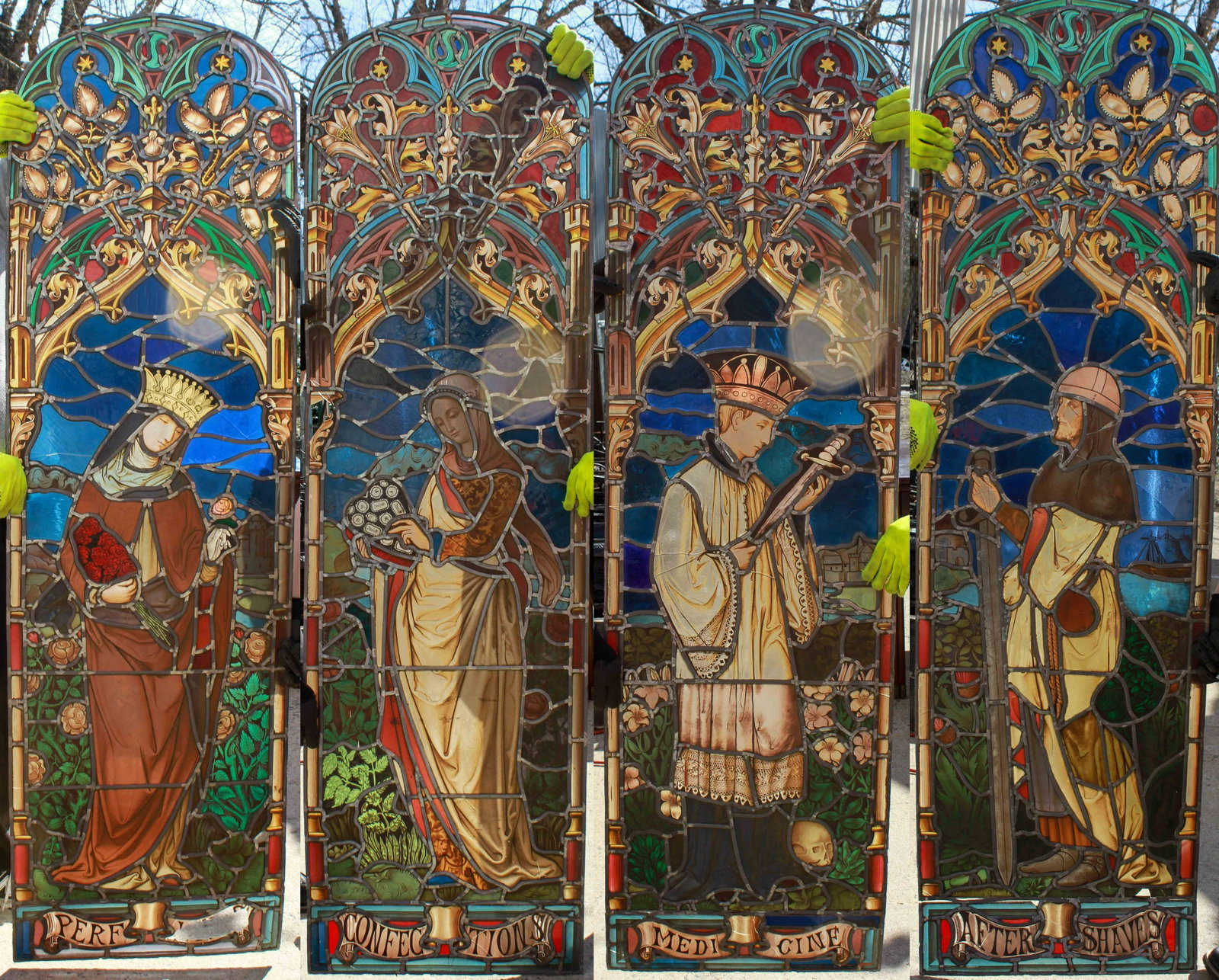 (4) Leaded Stained & Painted Glass Drug Store Windows: (4) Leaded Stained & Painted Glass Drug Store Windows, depicting Renaissance period figures, with reverse painted faces and detail, some etched decoration as well, each panel title in banners at botto
