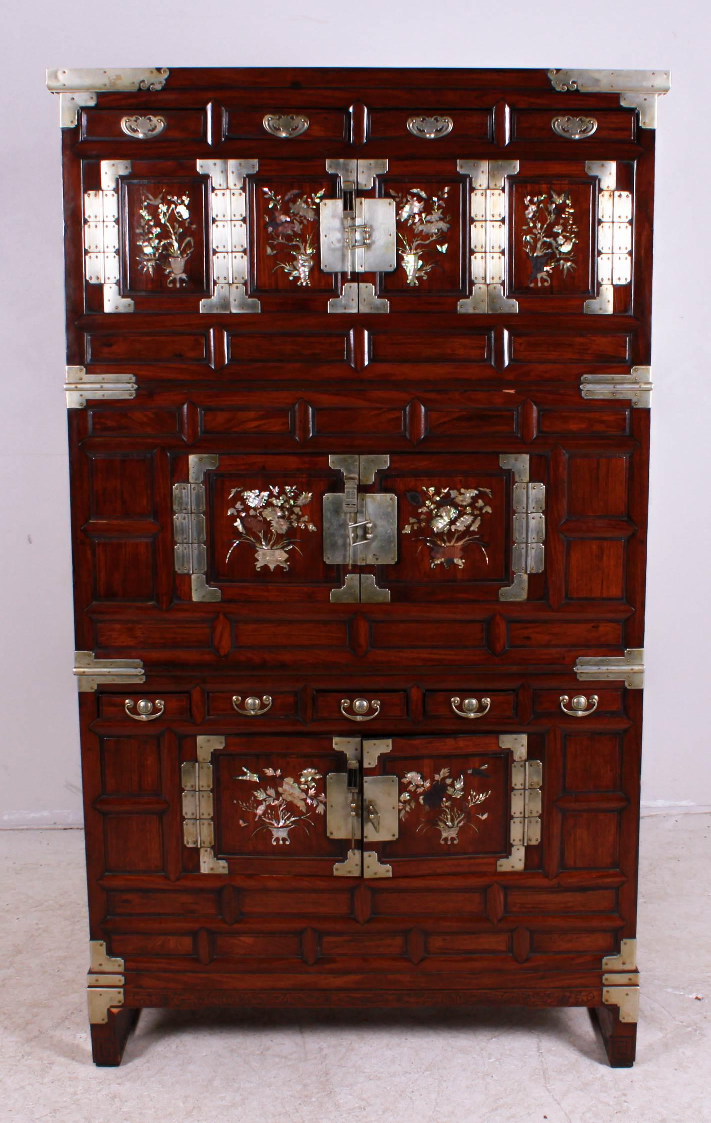 Korean Tansu Chest: Korean tansu chest, mother of pearl inlaid doors, metal mounts, 4 drawers over double folding doors over double doors over 5 drawers over double doors, 69-3/4" h x 40" w x 19" d