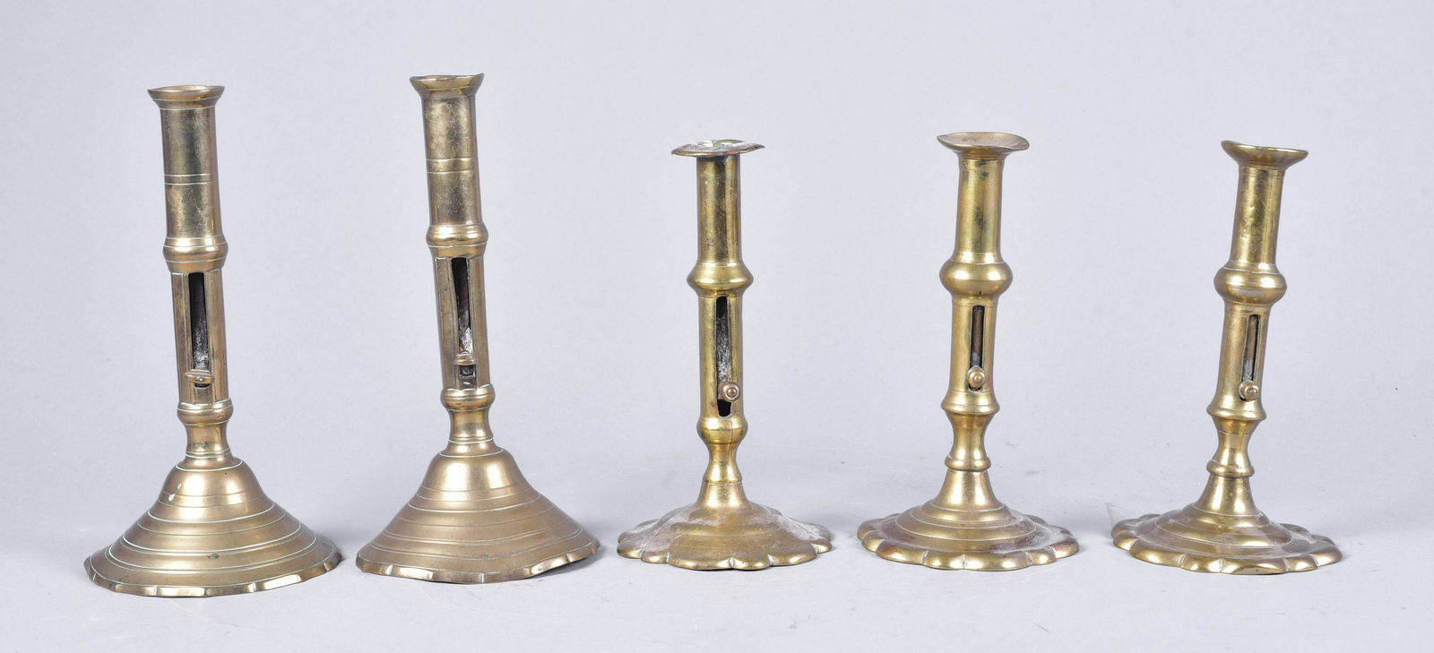 (5) Early Brass Push Up Candlesticks (1 of 1)