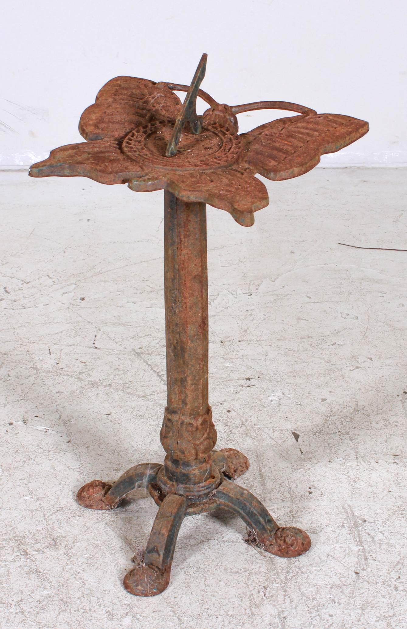 Iron butterfly sundial on pedestal (1 of 2)