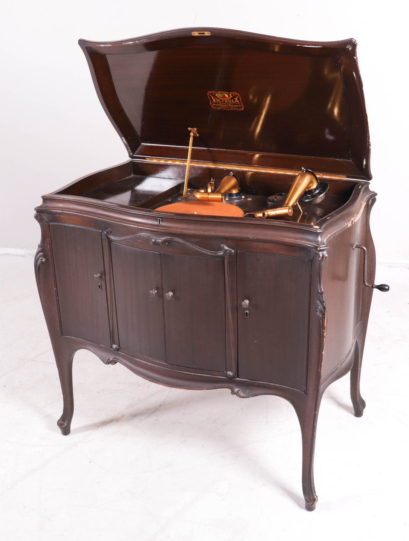 Mahogany Victor VV-230 console victrola: Mahogany Victor VV-230 console victrola, with crank and reproducer, 37"h x 38"w x 23"d, damaged upper right side