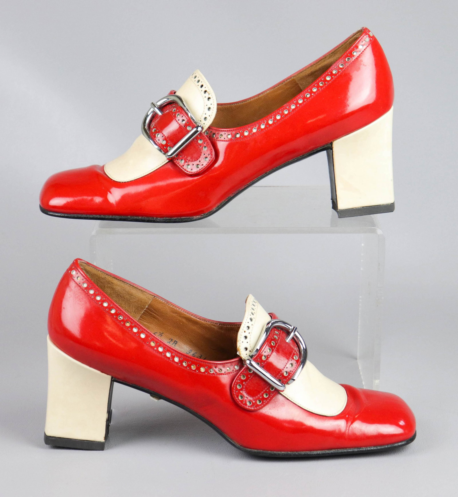 1960's Christian Dior Pumps: 1960's Christian Dior pumps, unworn, red and bone patent leather, leather-covered block heel, decorative perforations and silver buckled bridge, Souliers Christian Dior, label at sole reading Marshall