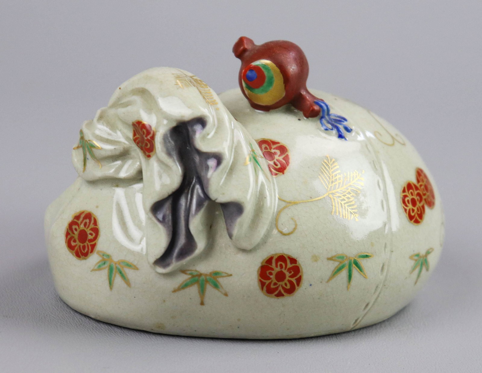 Japanese Sack & Hammer Figure: Japanese Kyotoyaki Okimono Daikokus sack & hammer figurine, signed Meiji Taisho, impressed & hand written marks to base, 5" x 3-1/2" x 3-1/4" h