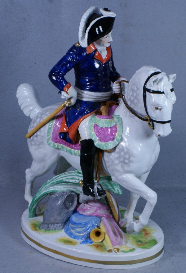 Ludwigsburg porcelain figure of a mounted officer,: Ludwigsburg porcelain figure of a mounted officer, on an oval base with armor, a sword, and a shield laying on the ground, with the crowned "Friedrich Rex" impressed mark used from 1806 to 1816, 19" t