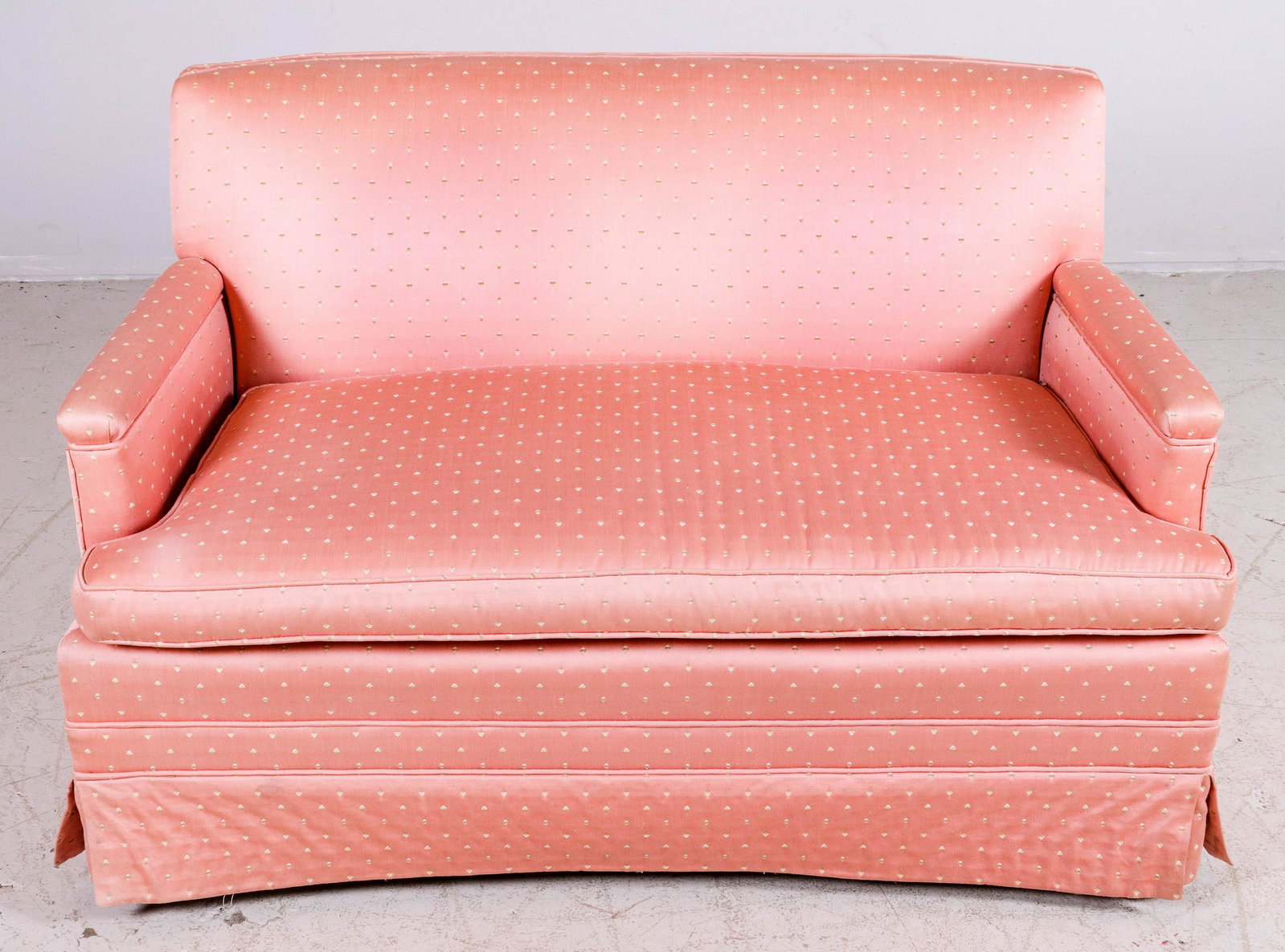 Pink Upholstered Loveseat: Pink upholstered loveseat, single cushion 48" W, 31" H