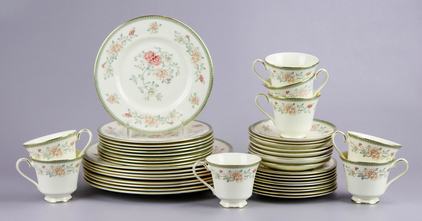 (42) Minton 'Jasmine' Dinnerware: (42) Minton 'Jasmine' dinnerware to include (8) dinner plates, 10-3/4" diam, (9) salad plates, 8" diam, (9) b + b plates, 6-1/2" diam, (8) teacups and (8) saucers. Excellent condition