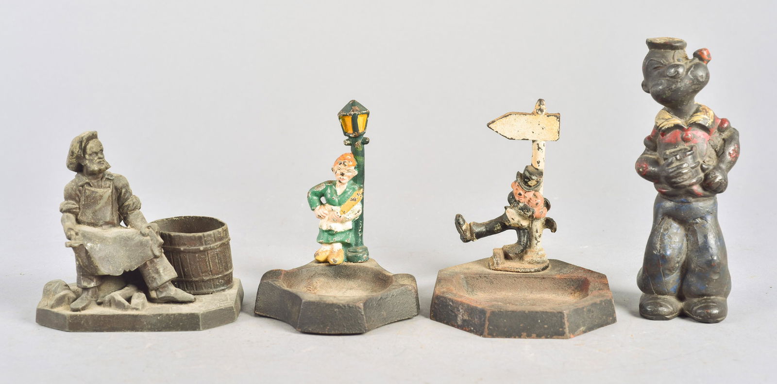 (4) Cast Iron Ashtrays and Doorstop (1 of 1)