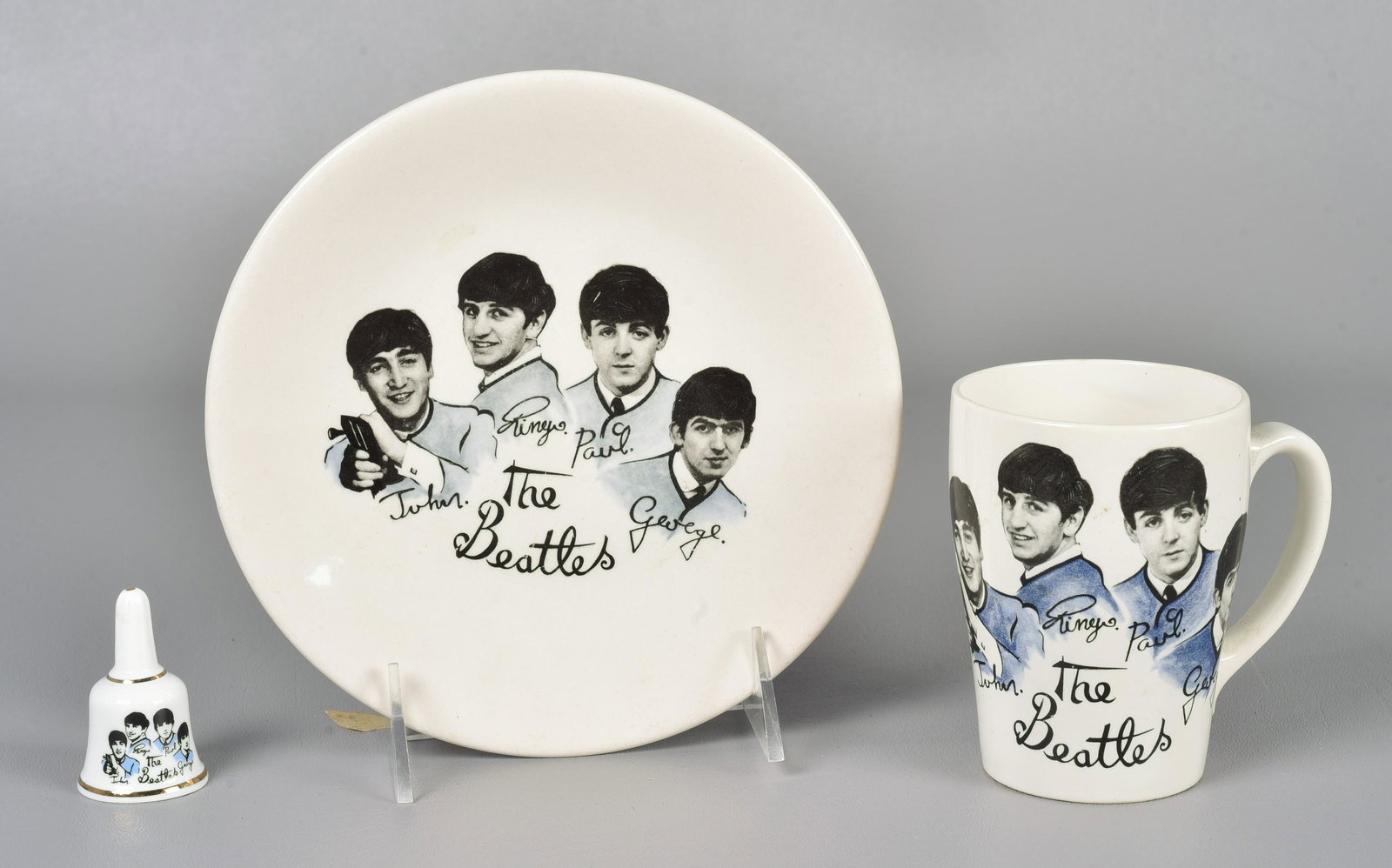 Beatles Washington Pottery Mug & Plate: Beatles mug & plate, featuring black & white photo images with drawn jackets, Washington Pottery Ltd Hanley England, c/o 3-7/8" mug & 7" plate, plate has certificate of authenticity from R&R Enterpris