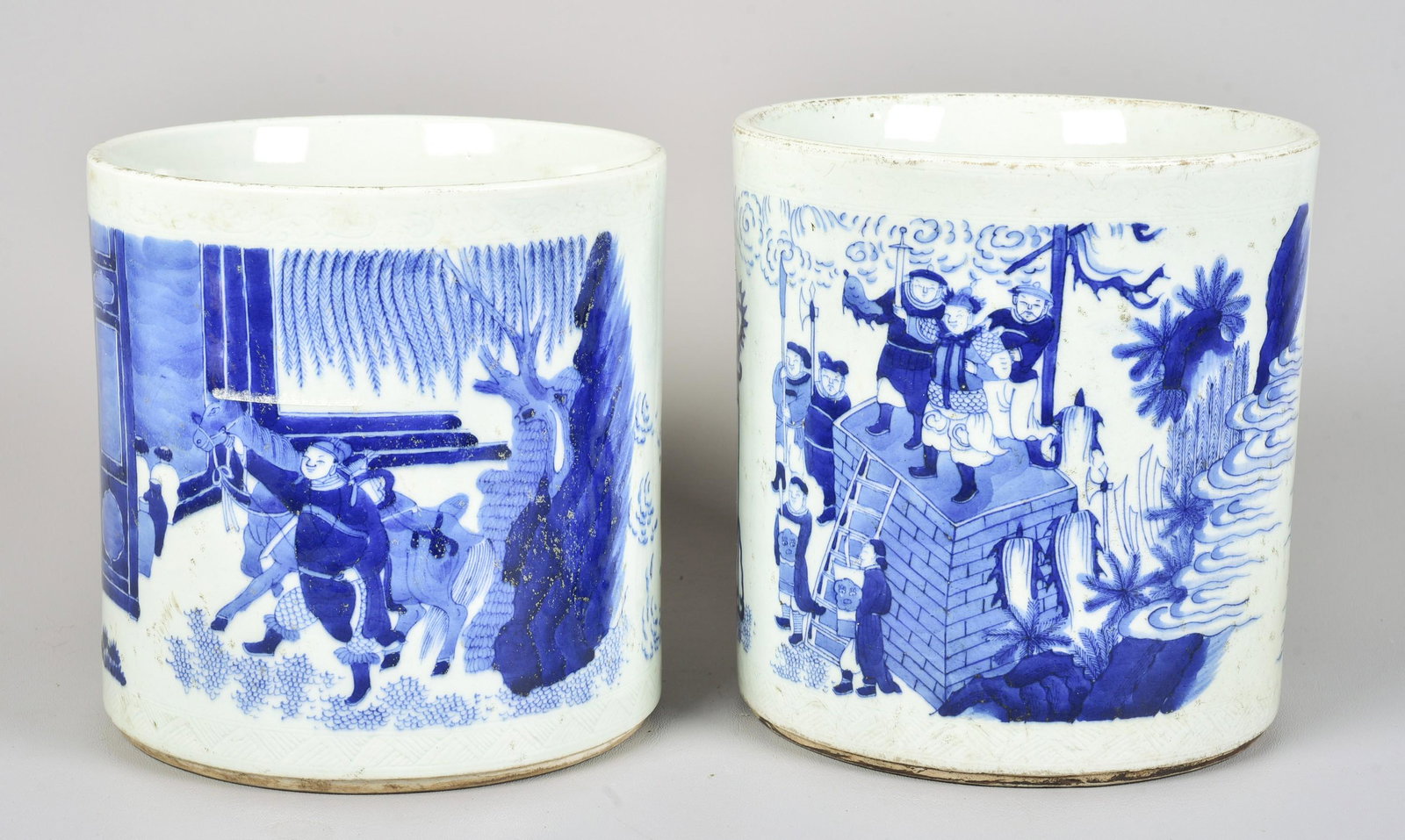 (2) Chinese Blue & White Porcelain Brush Pots: (2) Chinese blue & white porcelain brush pots, one with 6-character mark to rim, one unmarked, largest 8" h x 7-1/2" dia