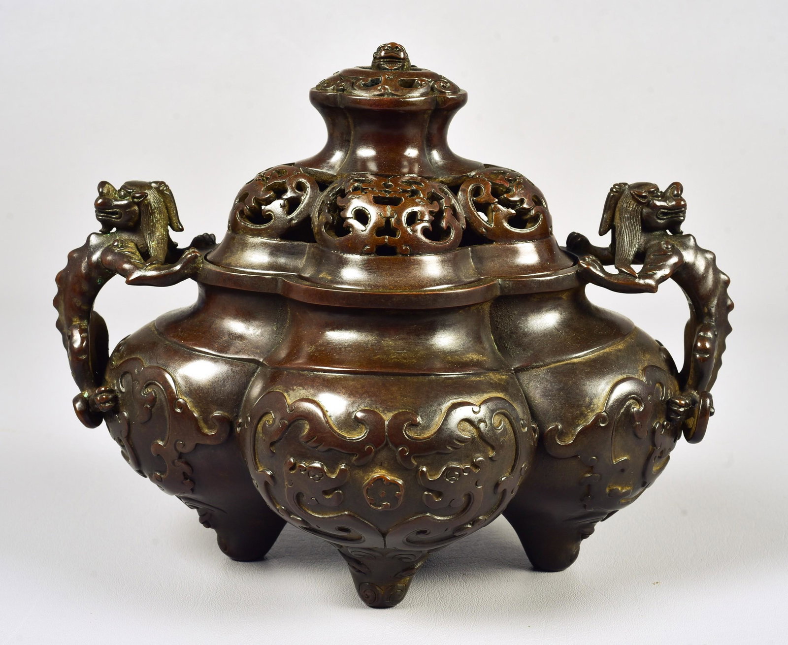 Chinese Bronze Censer: Chinese bronze censer, stylized dragon decoration & handles, impressed mark to base, 11" w x 8-3/4" h
