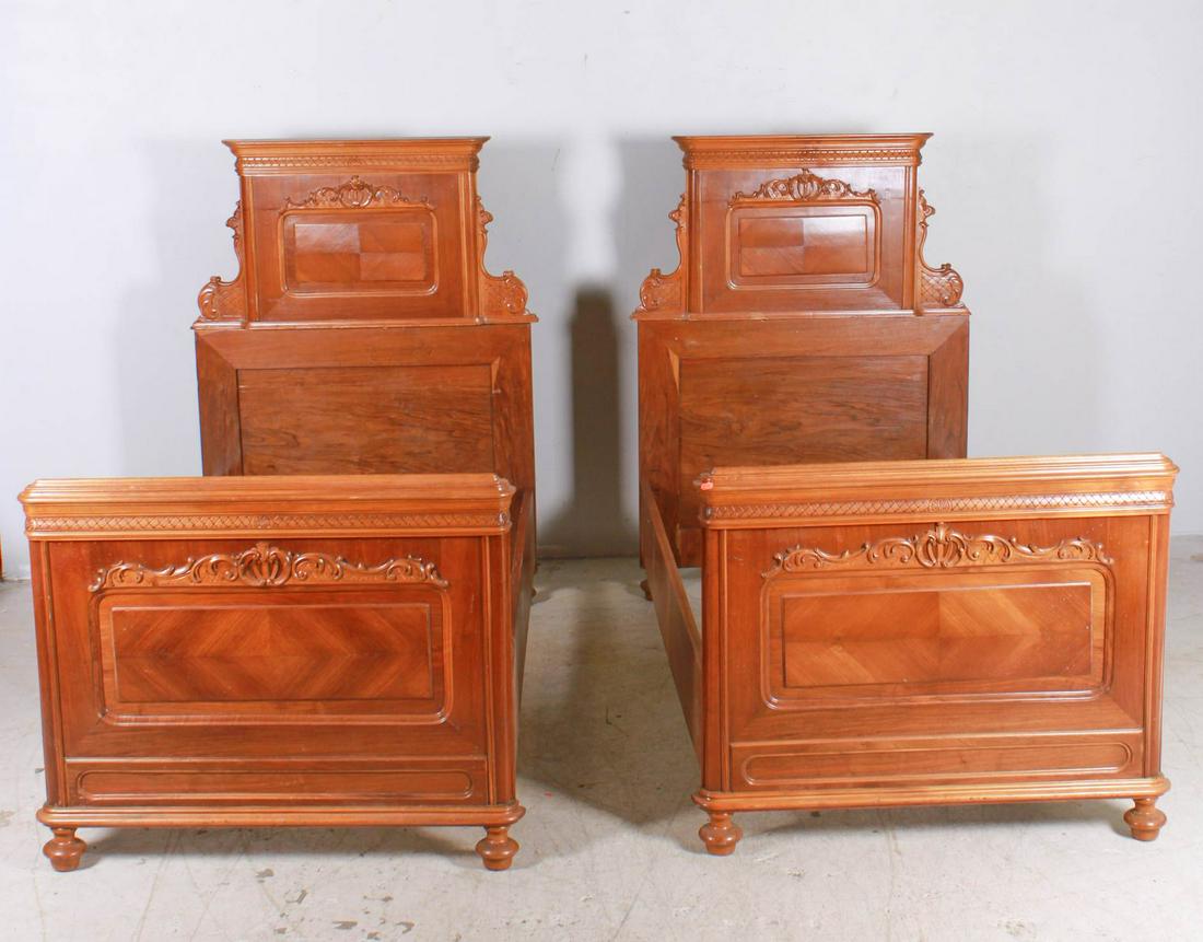 Pair Victorian twin size walnut carved beds (1 of 3)