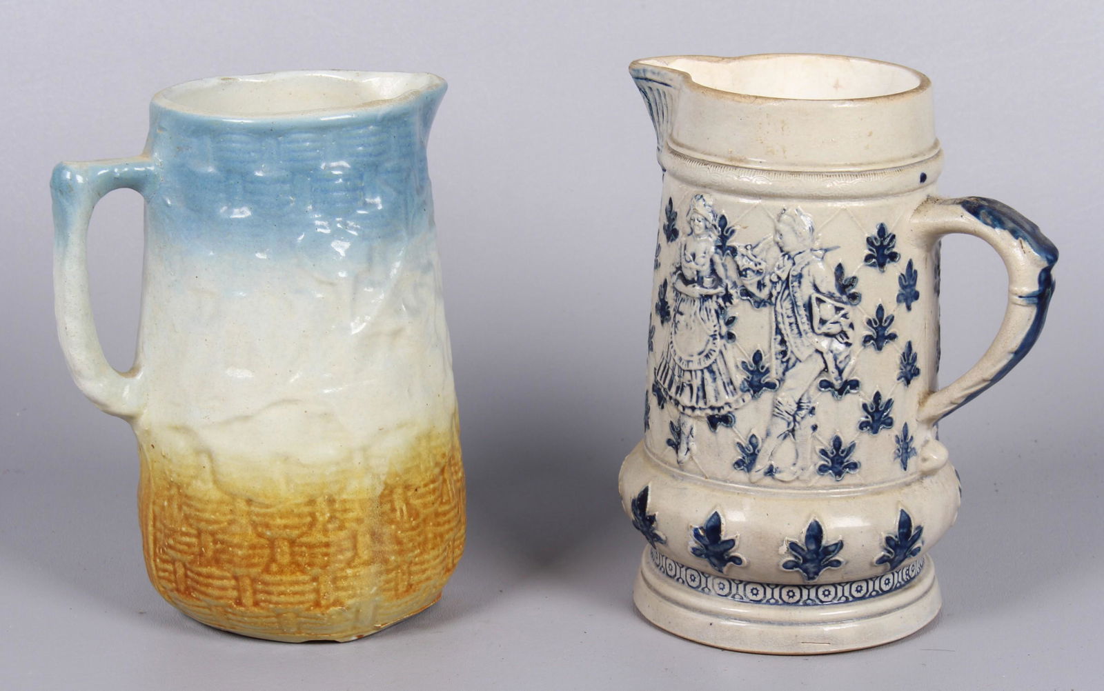 (2) Stoneware pitchers (1 of 4)