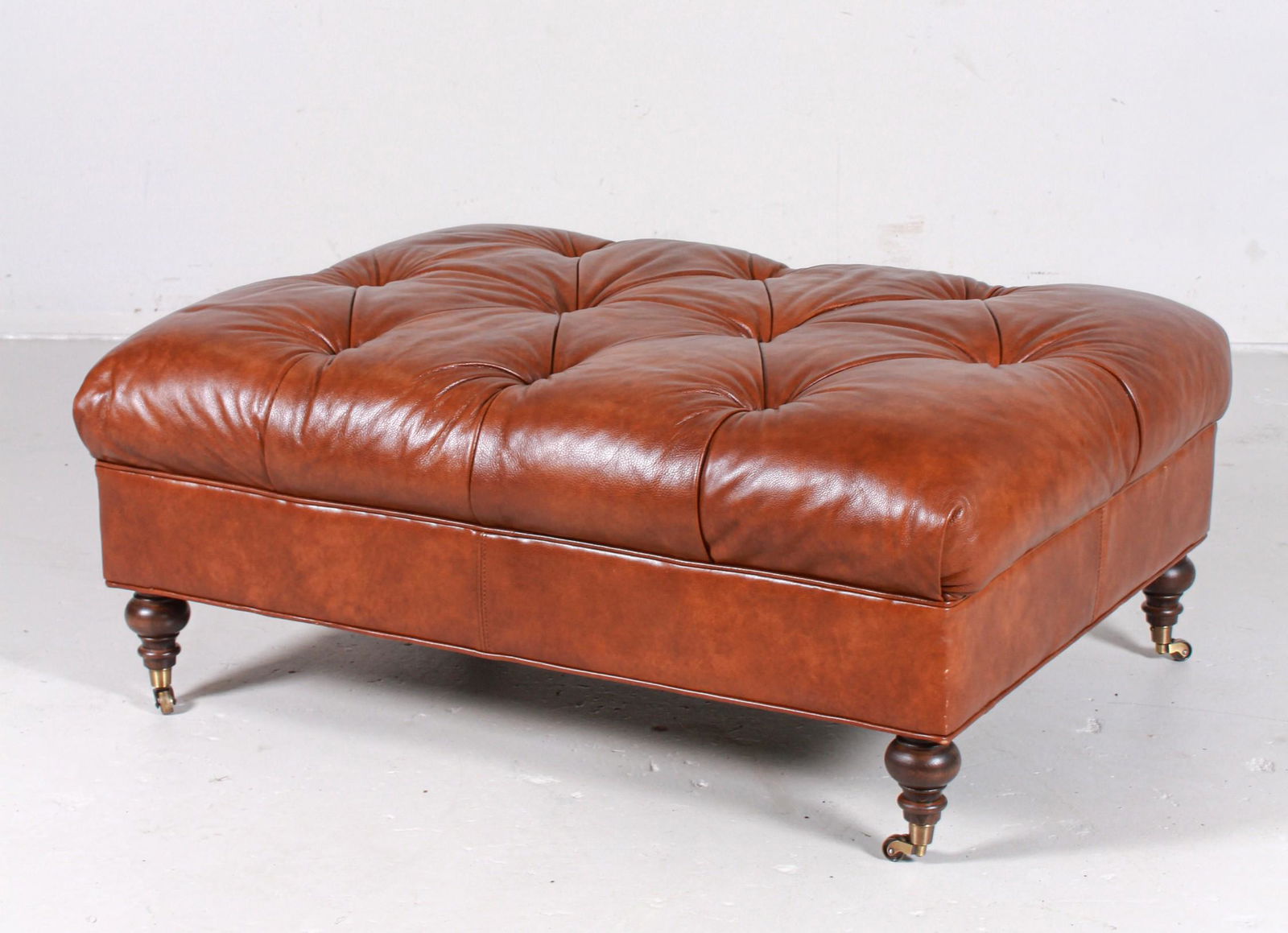 Smith Brothers tufted leather ottoman (1 of 2)