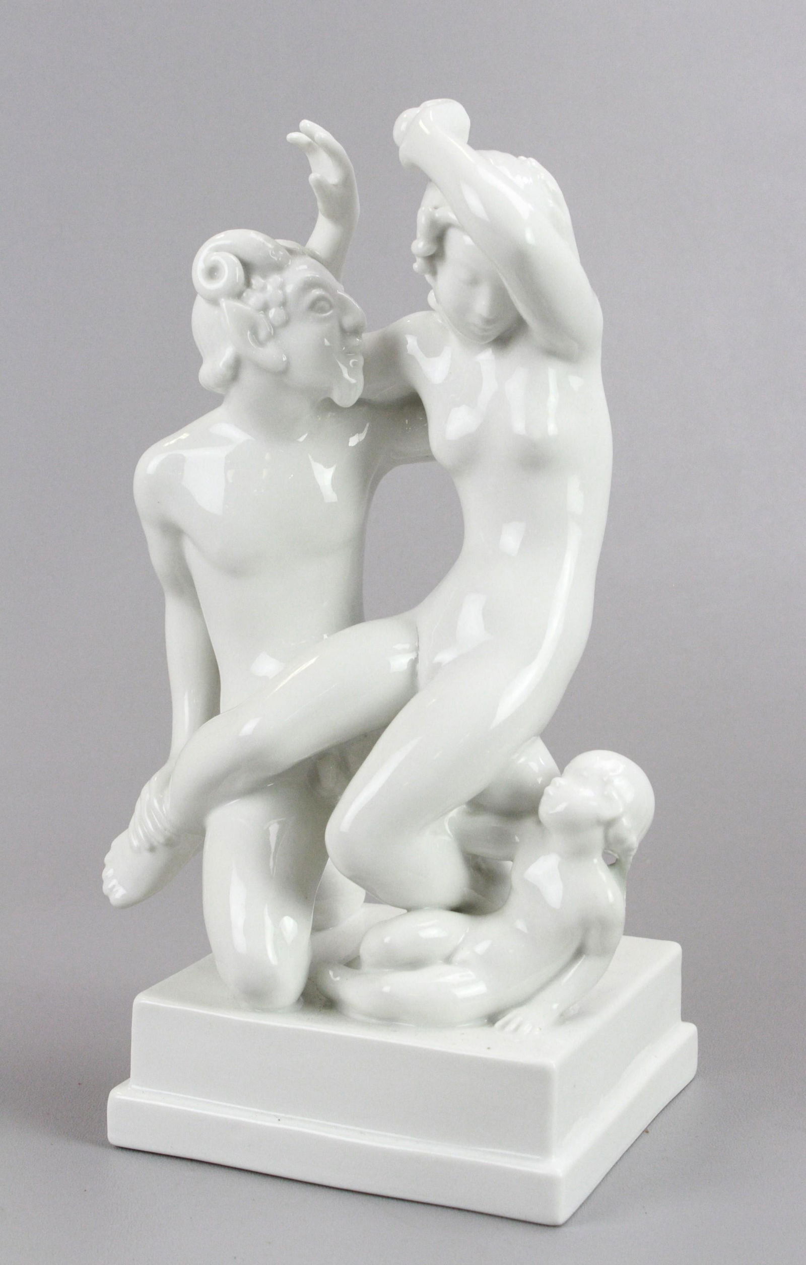 Dahl Jensen Satyr and his Nymph Figure: Dahl Jensen Satyr and his Nymph blanc de chine porcelain figurine, #1039, Copenhagen Denmark, 11" h, one finger needs to be reattached