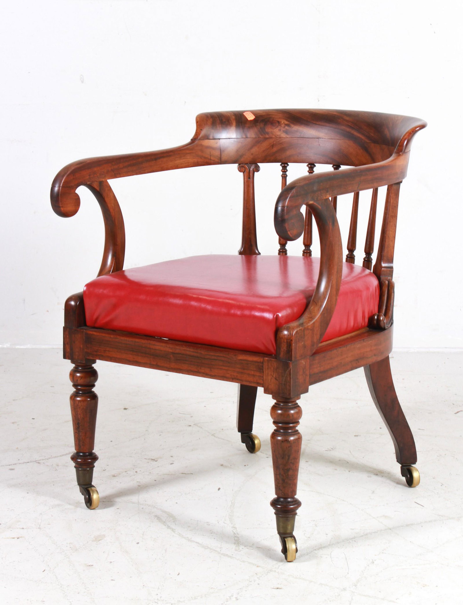 William IV exotic hardwood armchair: A William IV carved exotic hardwood armchair, second quarter 19th century, height 30 1/2in; width 22in; depth of seat 19 1/2in; depth overall 26in, Structurally sound. The vinyl upholstered seat in ge
