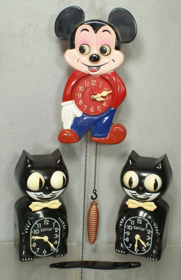 Mi-Ken Mickey Mouse cuckoo clock, moving eyes, wit: Mi-Ken Mickey Mouse cuckoo clock, moving eyes, with (2) "As How" Kit-Kat clocks, battery opperated, 1 missing tail, 1 original box