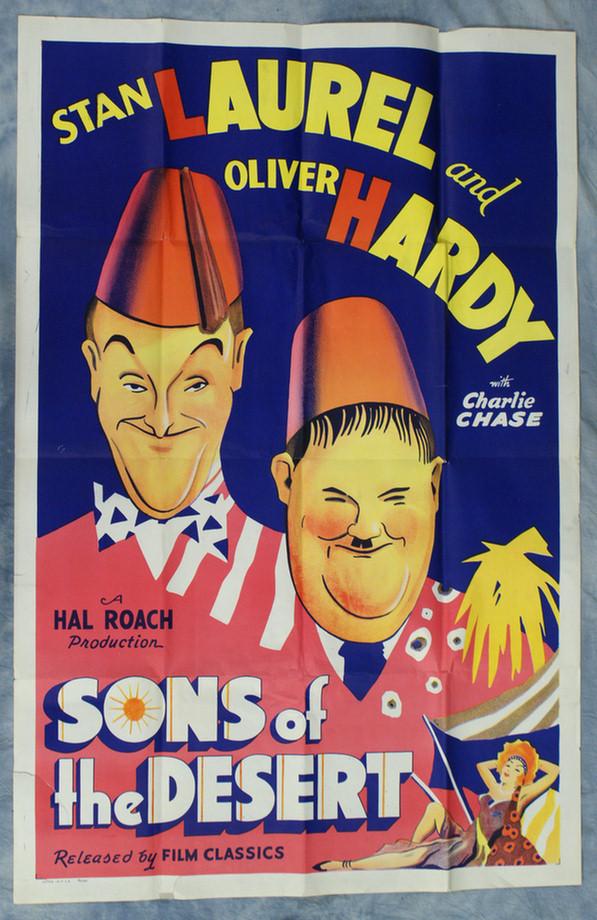 Stan Laurel and Oliver Hardy, Sons of the Desert movie : Stan Laurel and Oliver Hardy, Sons of the Desert movie poster, 1949 rerelease, fold marks visible, edge tears and three small holes in body of poster, great color, unrestored condition, 41"h x 27"w